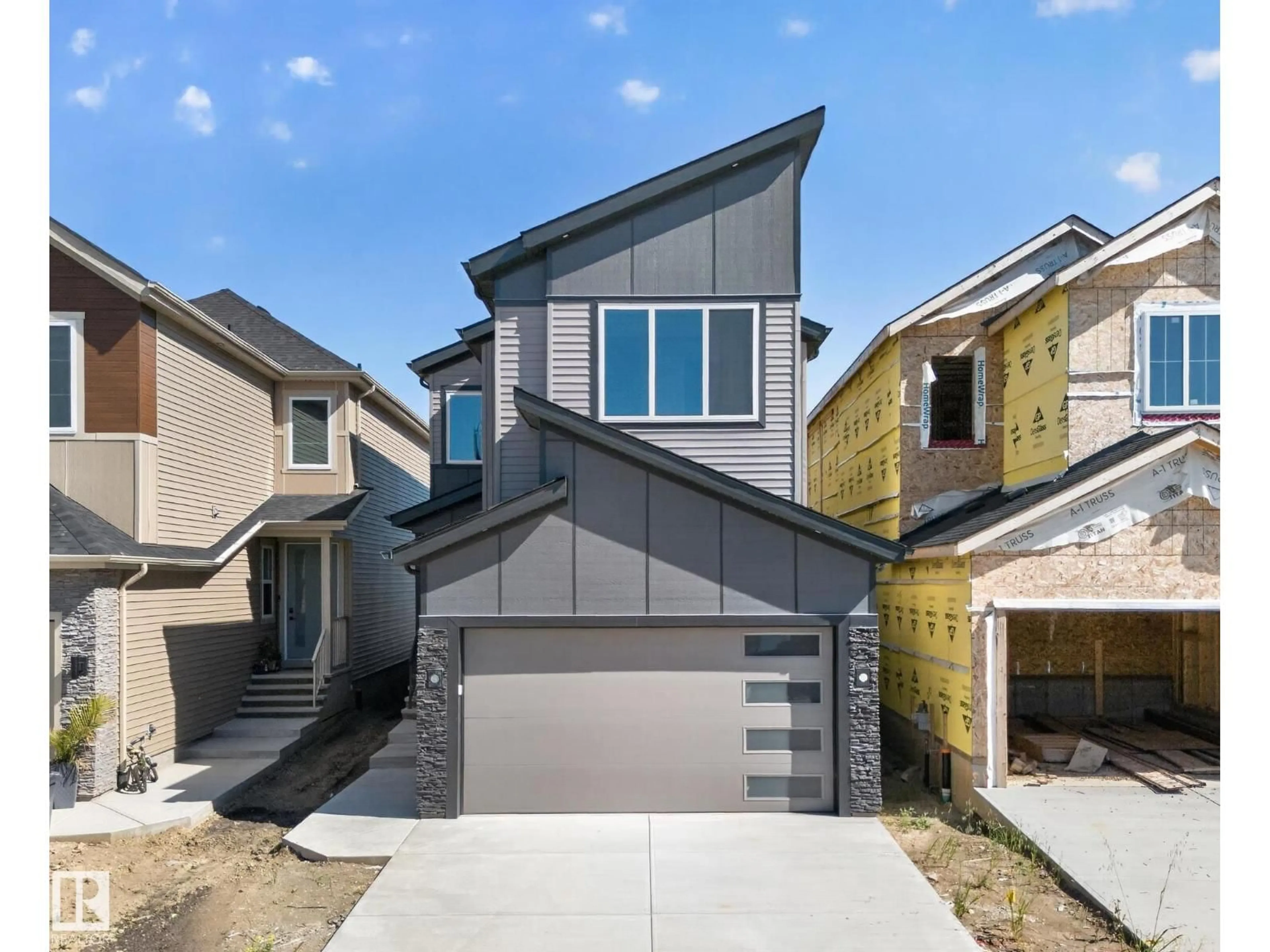 Home with vinyl exterior material, street for 214 CRYSTAL CREEK DRIVE, Leduc Alberta T9E0X6