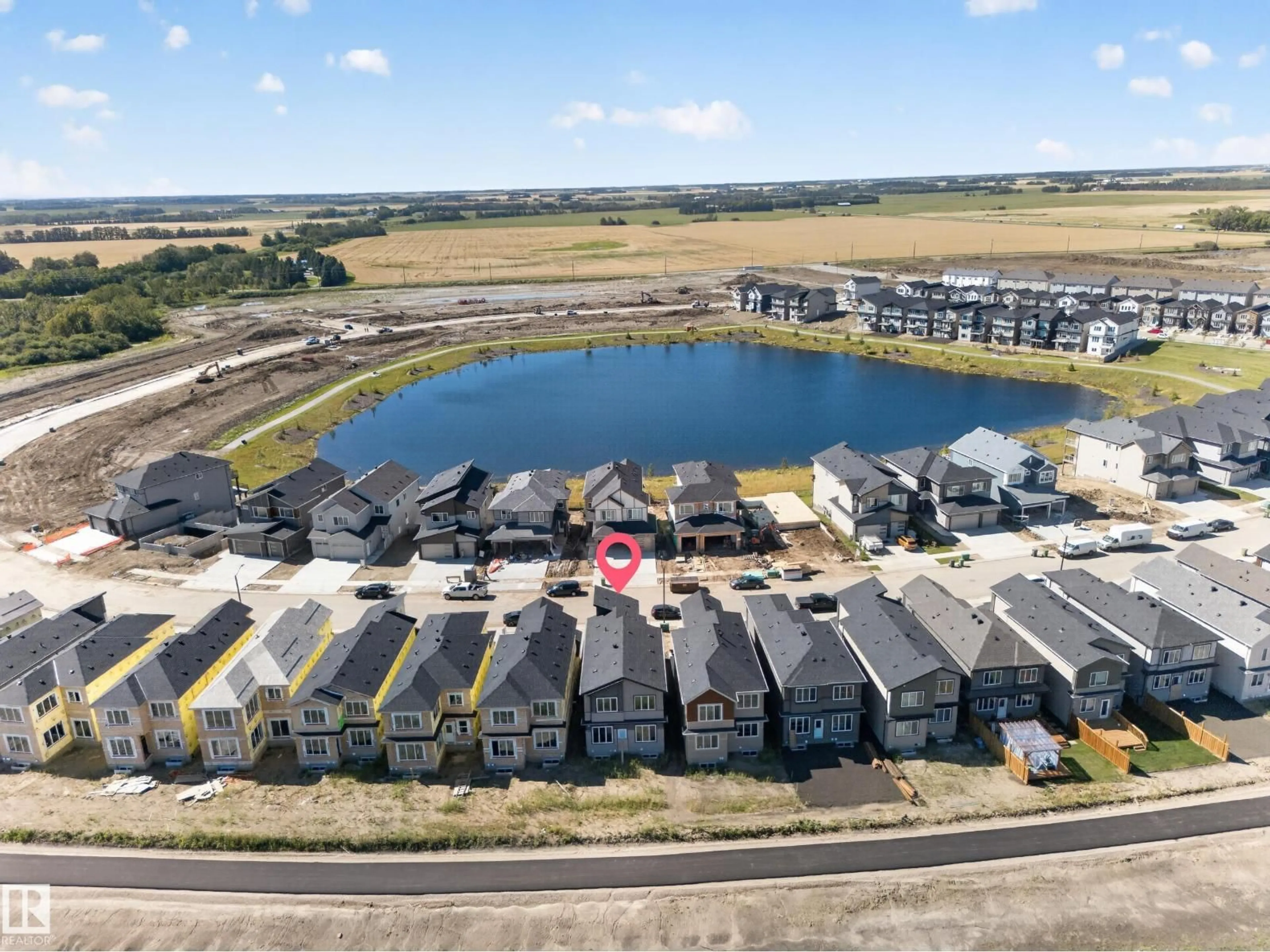 A pic from outside/outdoor area/front of a property/back of a property/a pic from drone, water/lake/river/ocean view for 214 CRYSTAL CREEK DRIVE, Leduc Alberta T9E0X6