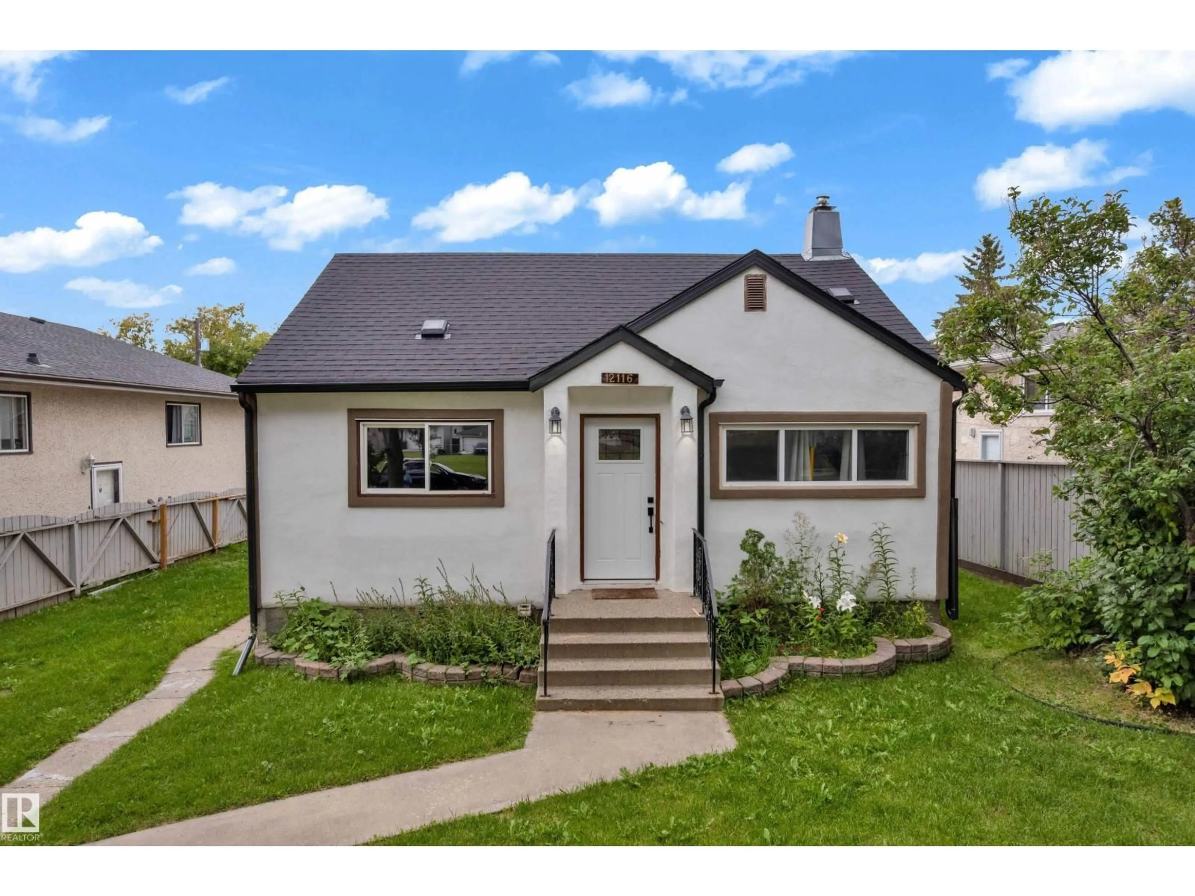 Home with vinyl exterior material, street for NW - 12116 81 ST, Edmonton Alberta T5B2T1