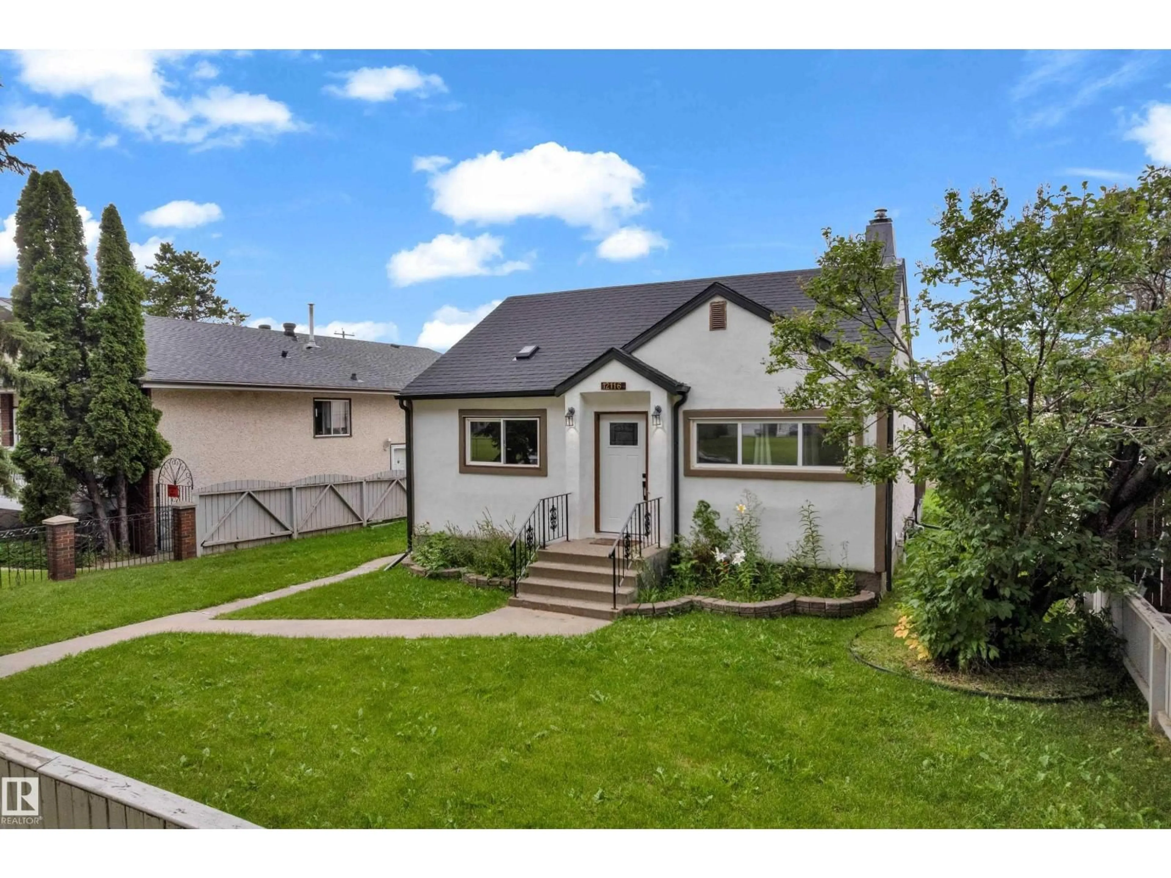 Home with vinyl exterior material, street for NW - 12116 81 ST, Edmonton Alberta T5B2T1