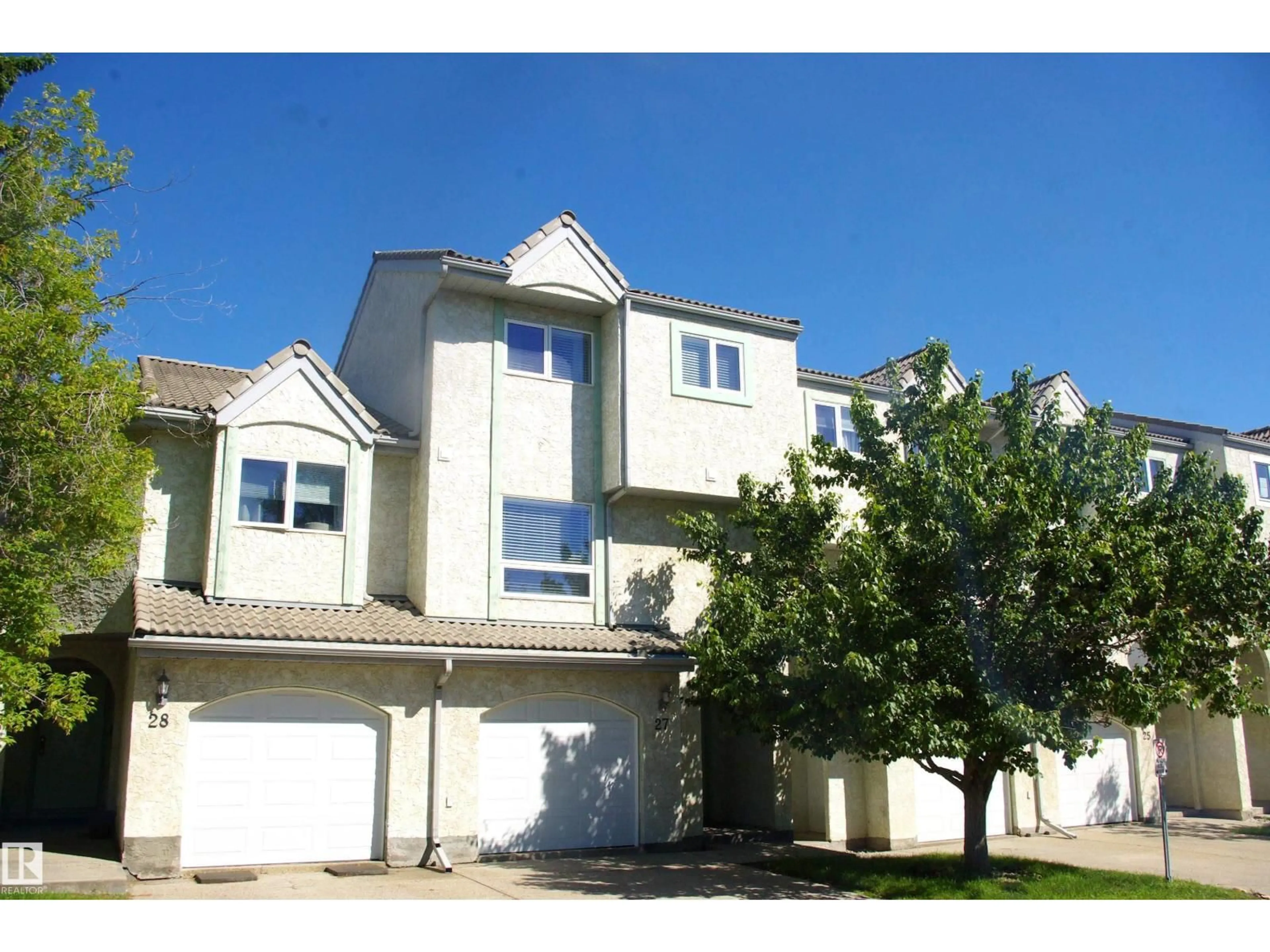 Home with vinyl exterior material, street for #27 - 9505 176 ST, Edmonton Alberta T5T5Z4