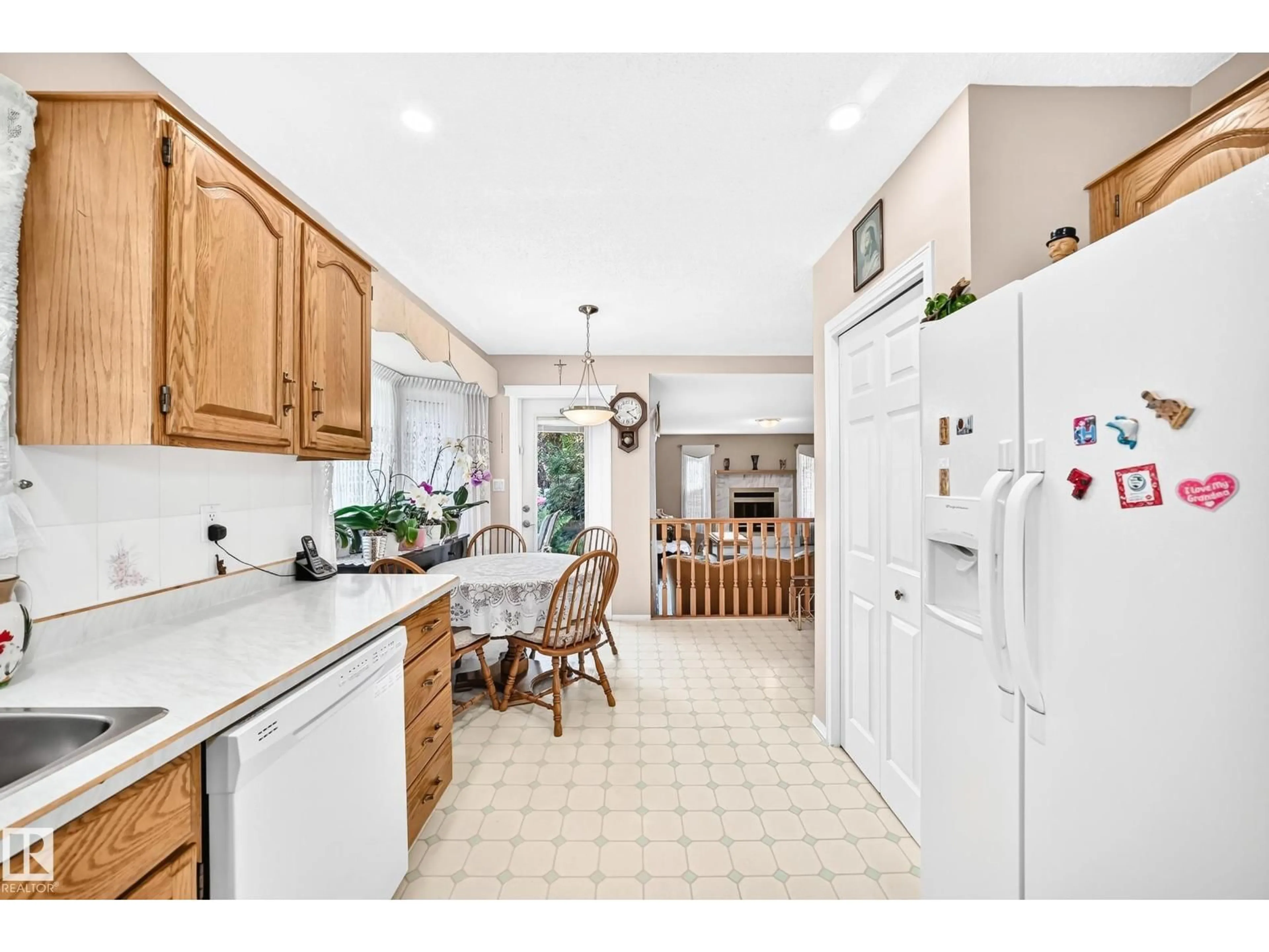 Open concept kitchen, ceramic/tile floor for NW - 4327 49 ST, Edmonton Alberta T6L6J5