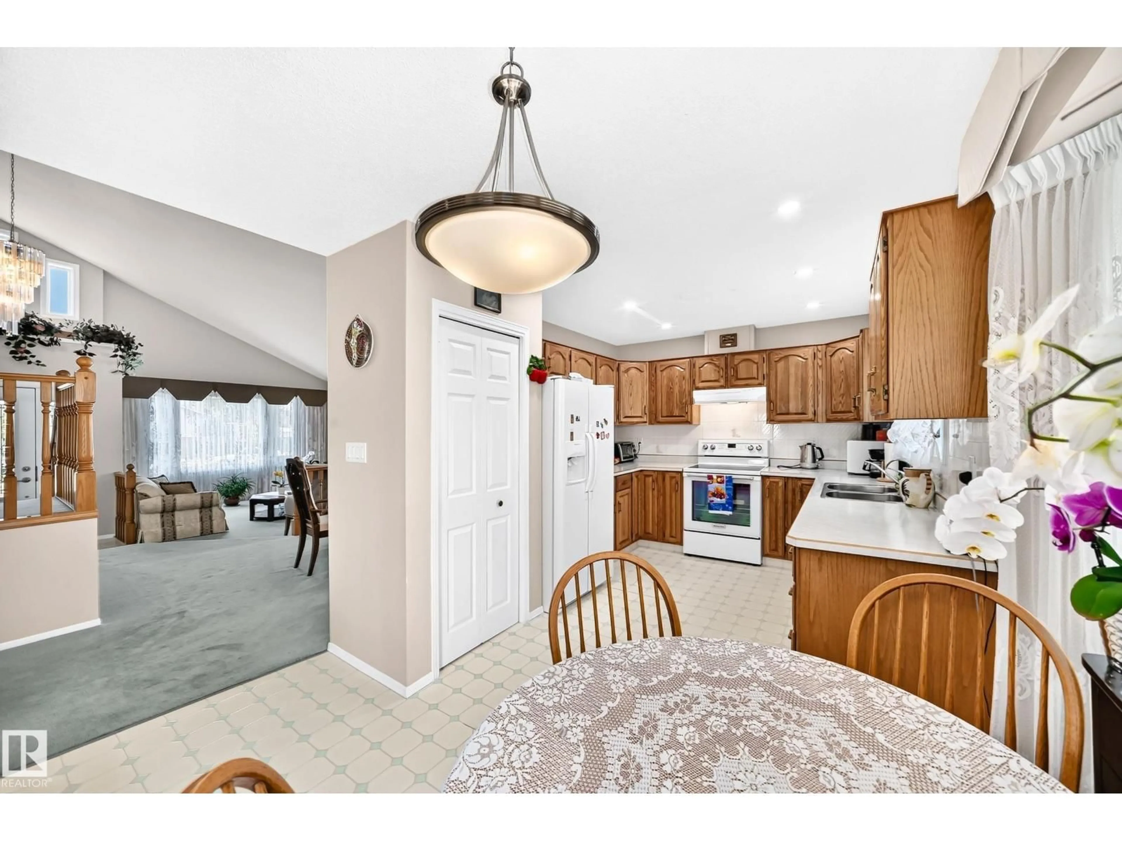 Open concept kitchen, ceramic/tile floor for NW - 4327 49 ST, Edmonton Alberta T6L6J5