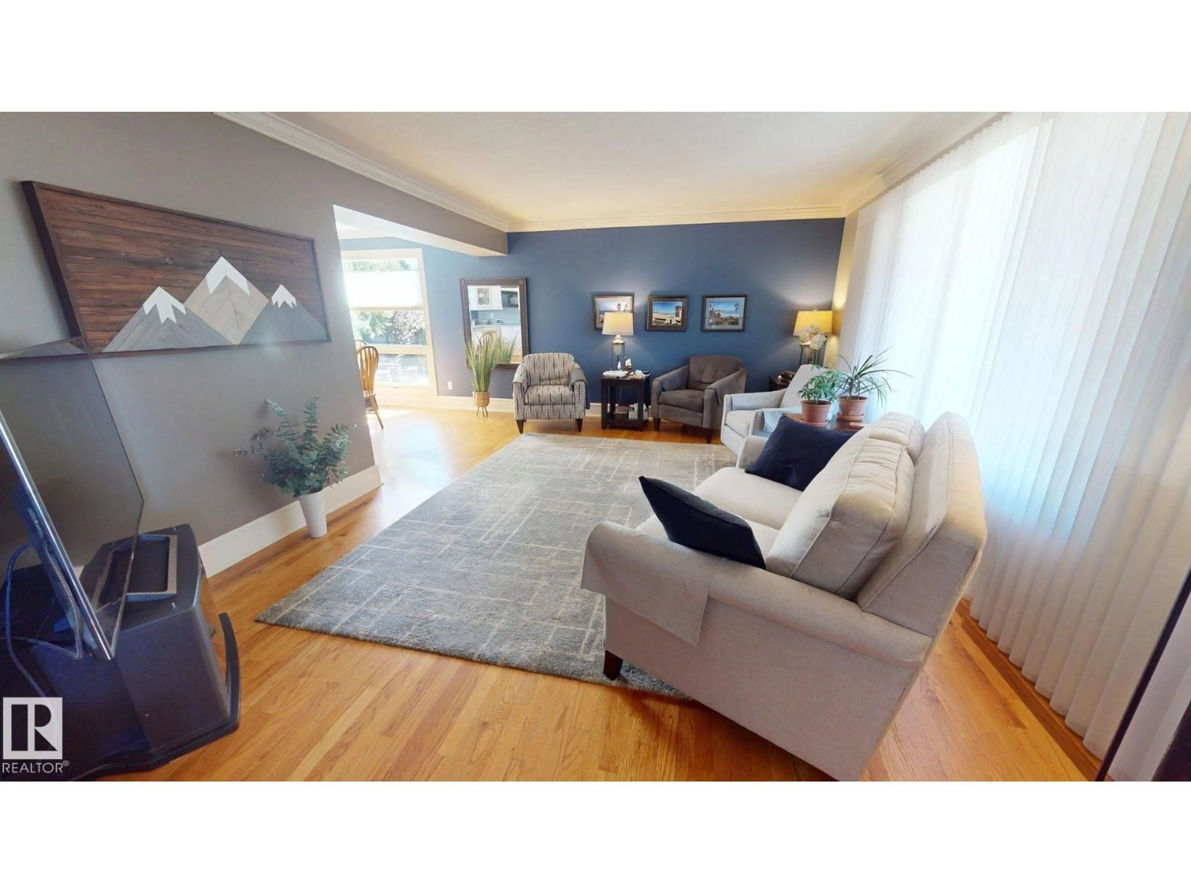 Living room with furniture, wood/laminate floor for 211 GRAHAM PL, Sherwood Park Alberta T8A3N8