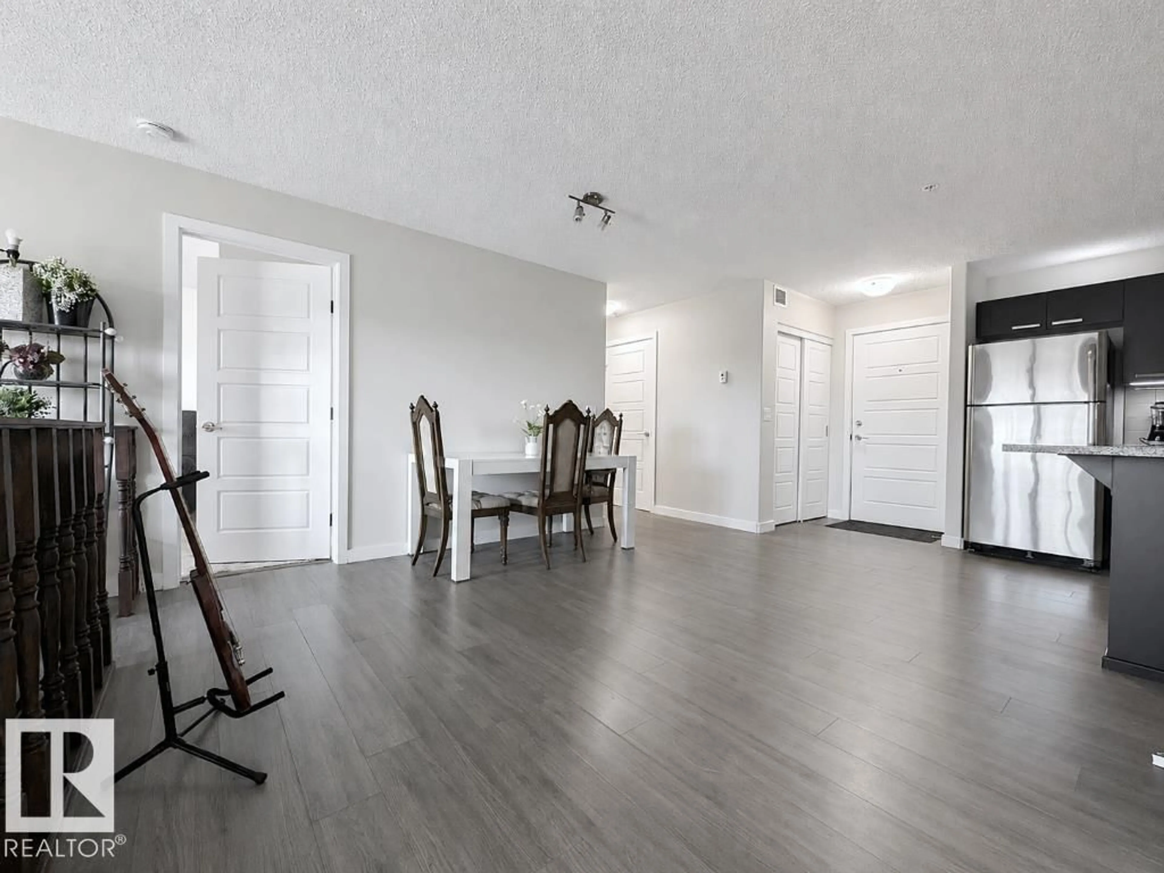 A pic of a room for #311 - 14808 125 ST, Edmonton Alberta T5X0G1