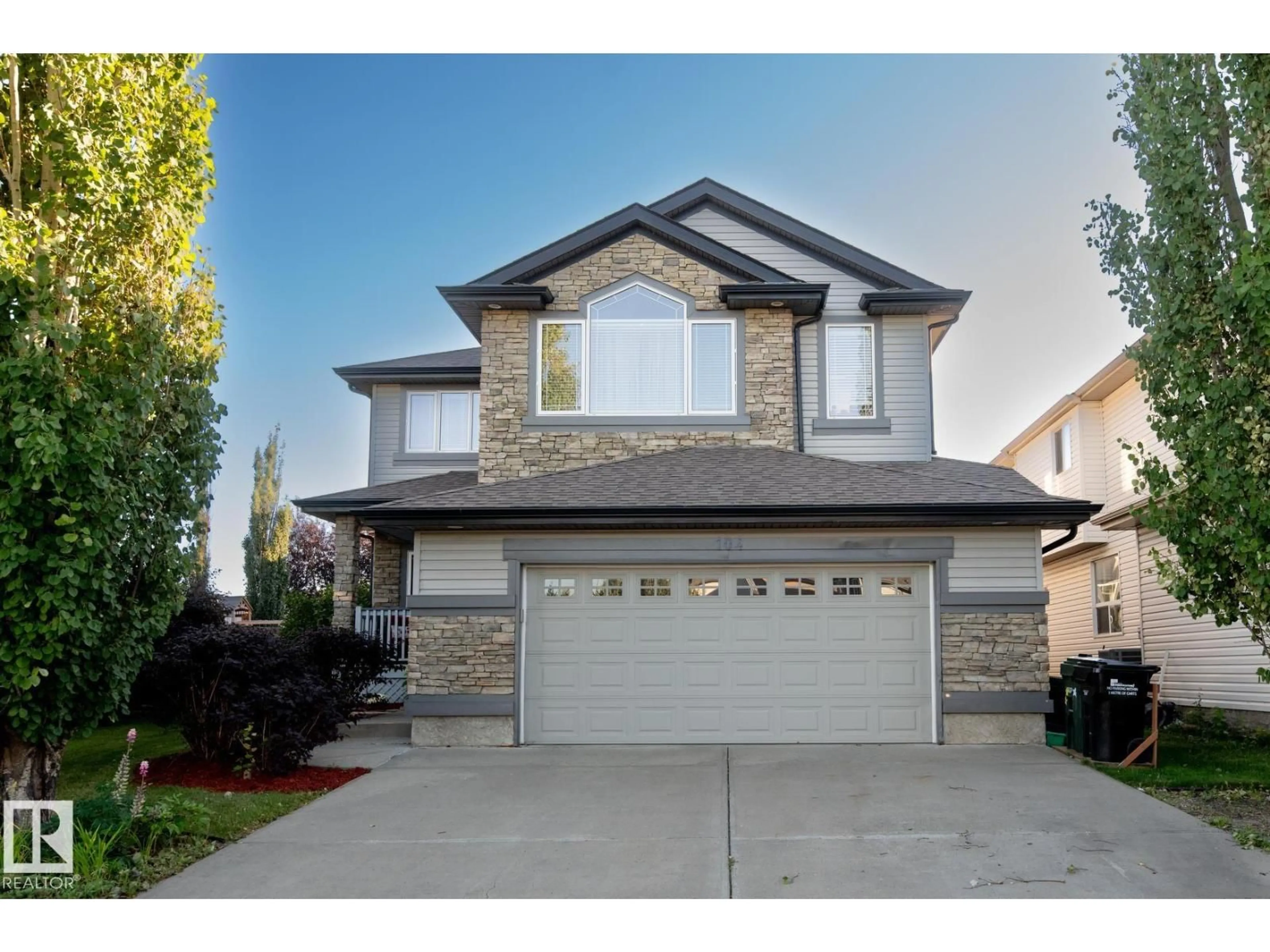 Home with vinyl exterior material, street for 104 CAMPBELL DR, Sherwood Park Alberta T8H0E3