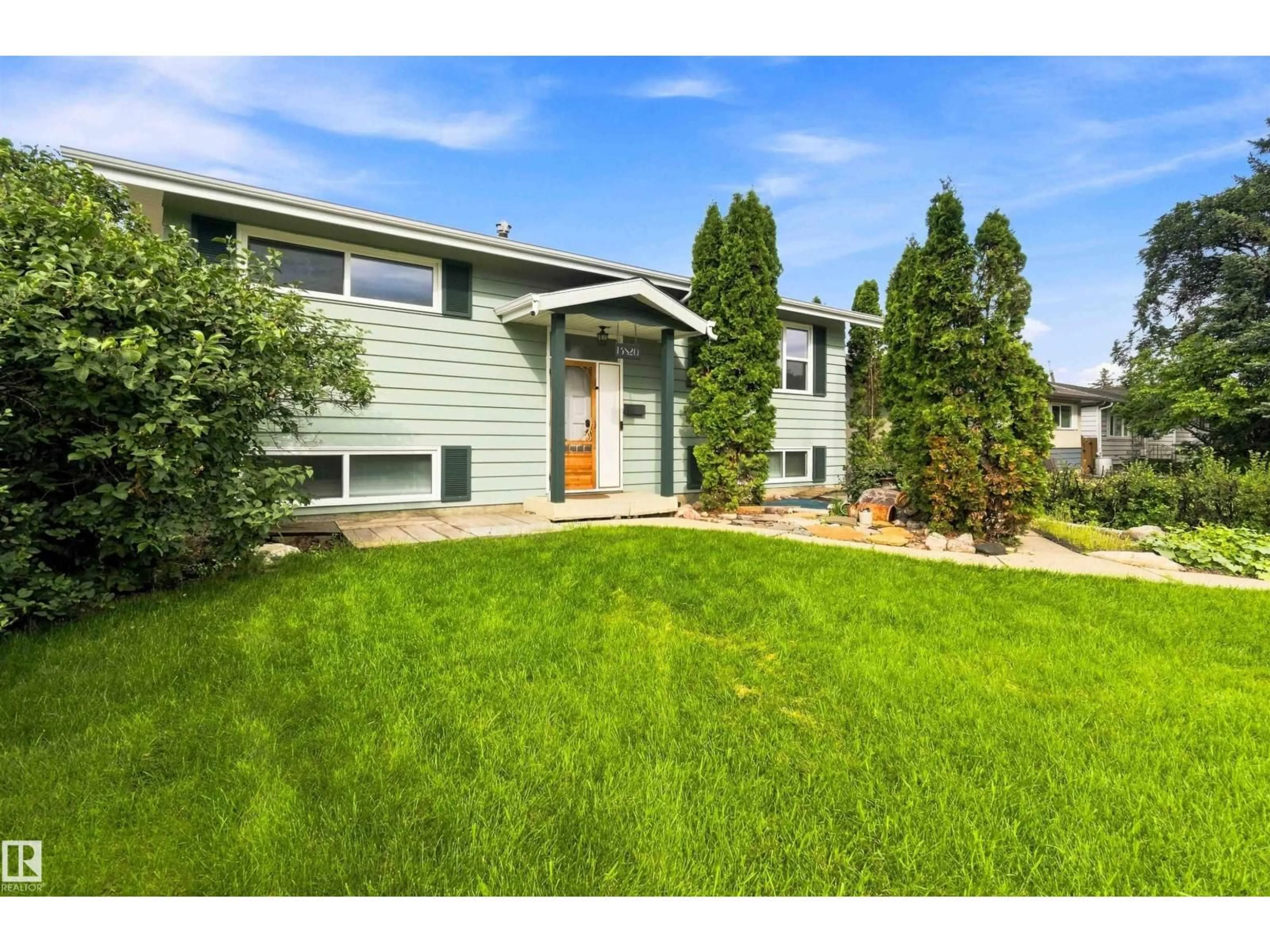Home with vinyl exterior material, street for NW - 13820 63 ST, Edmonton Alberta T5A1R3