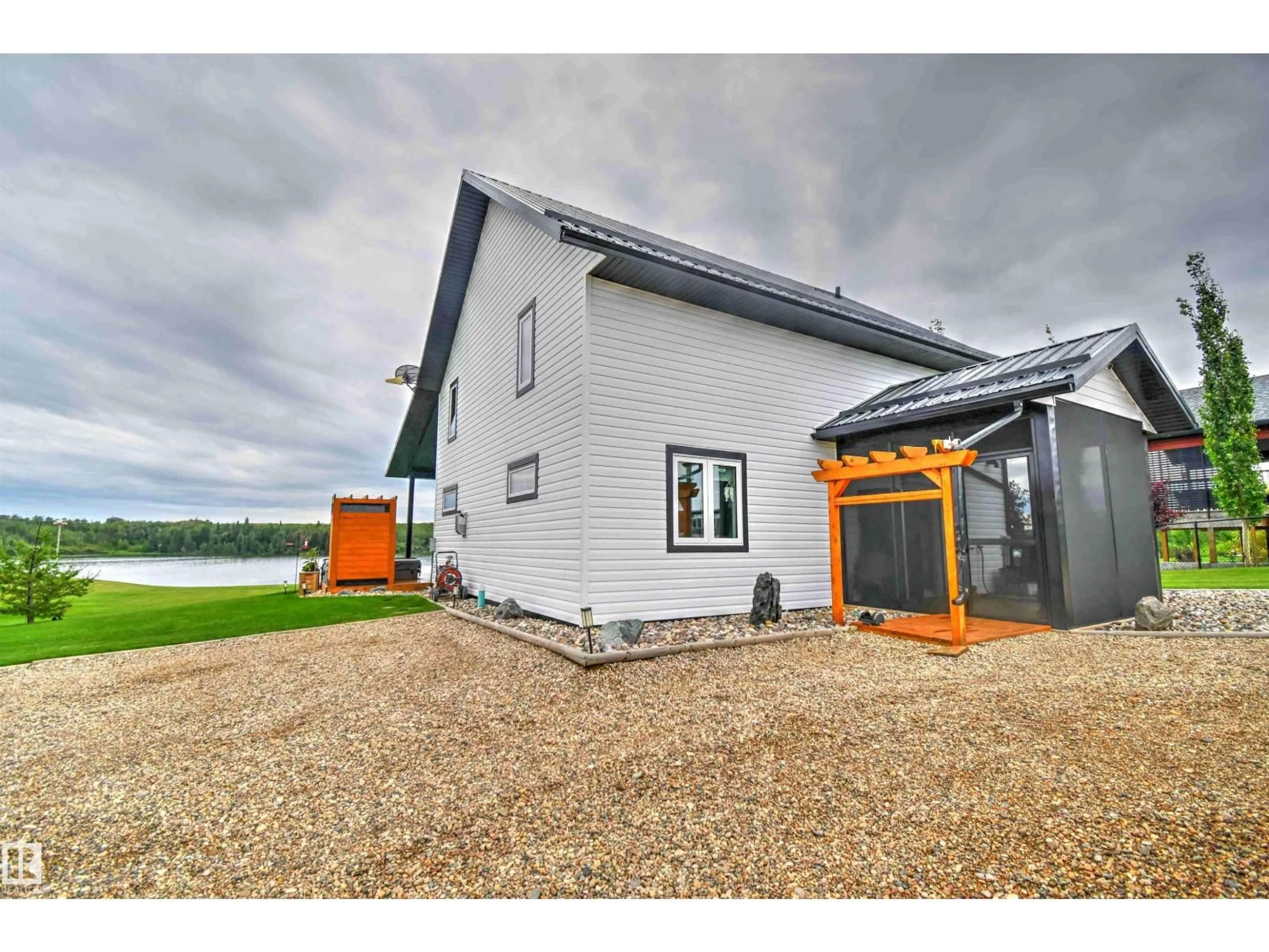 A pic from outside/outdoor area/front of a property/back of a property/a pic from drone, building for 735 56512 RR 111, Rural St. Paul County Alberta T0A2G0