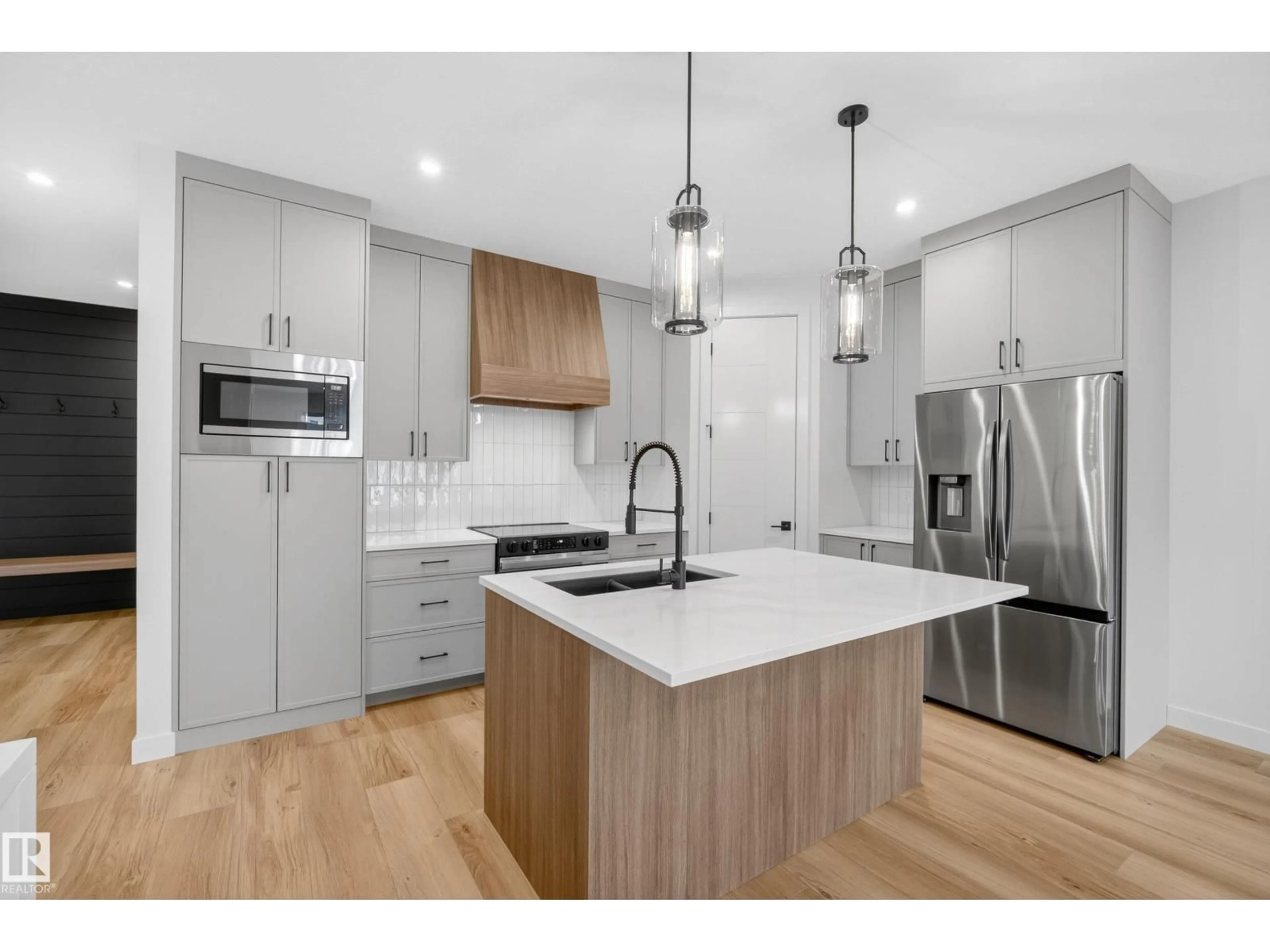 Open concept kitchen, wood/laminate floor for 99 NEWBURY CI, Sherwood Park Alberta T8B0E8