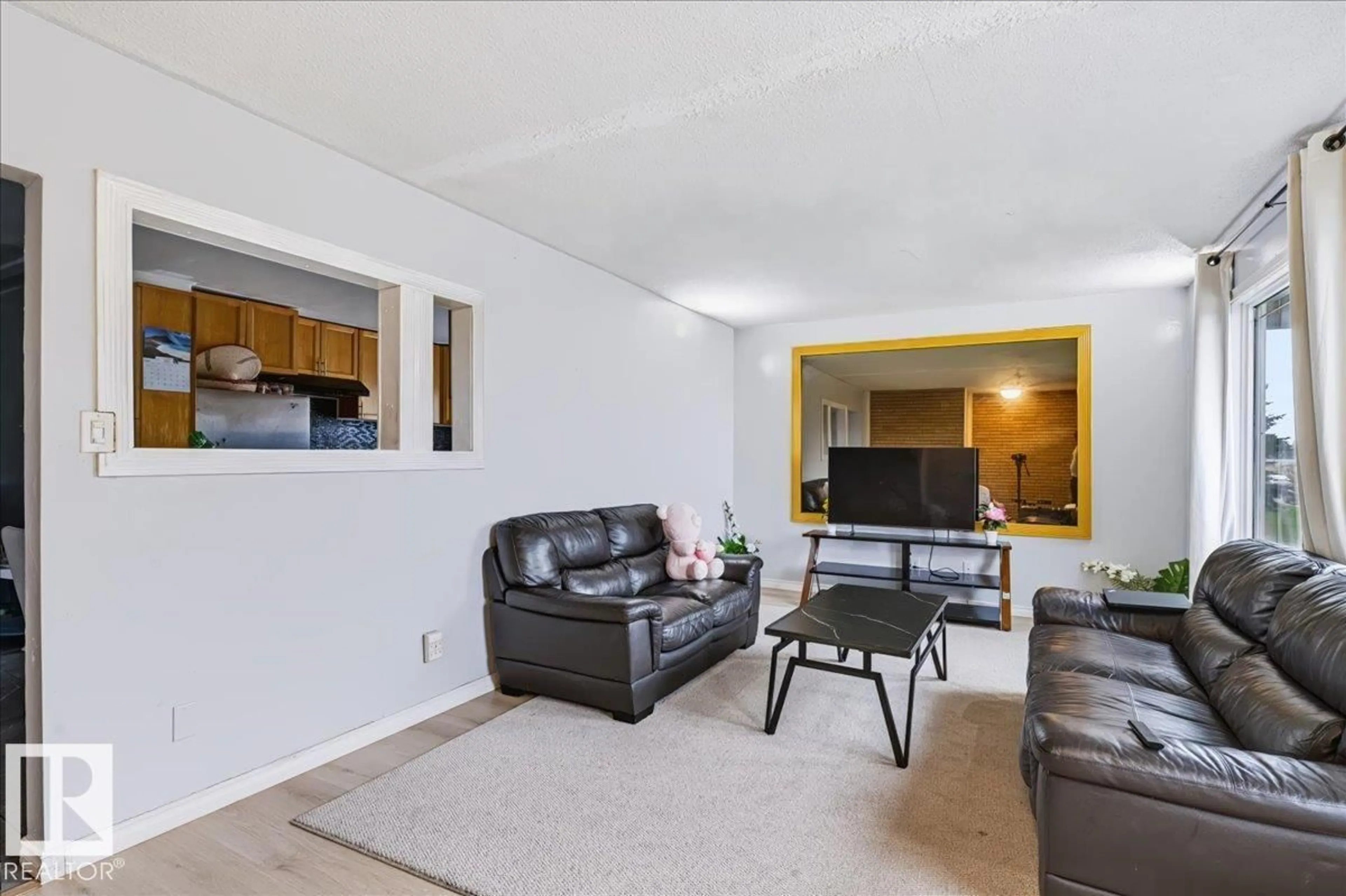 Living room with furniture, unknown for 12919 135 AV NW, Edmonton Alberta T5L3X7