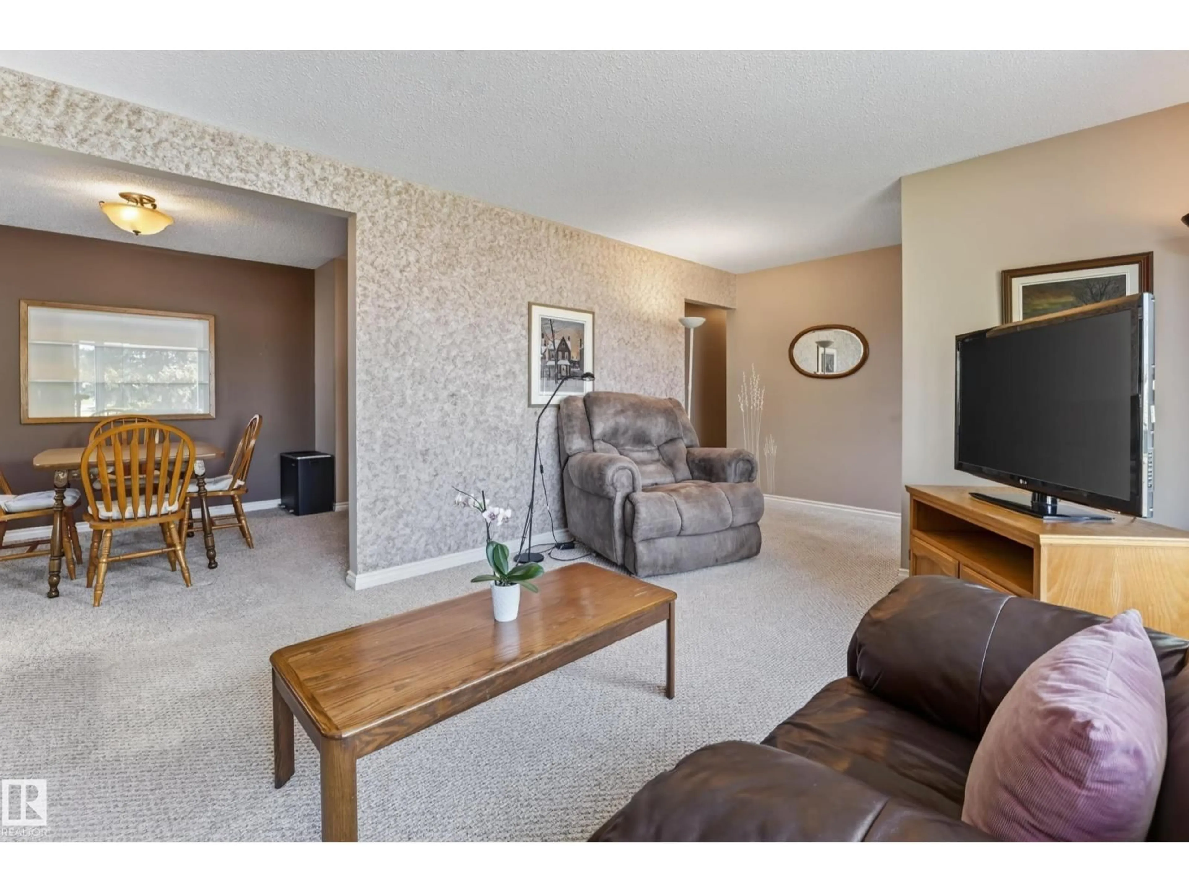 Living room with furniture, unknown for NW - 7503 135A AV, Edmonton Alberta T5C2J2