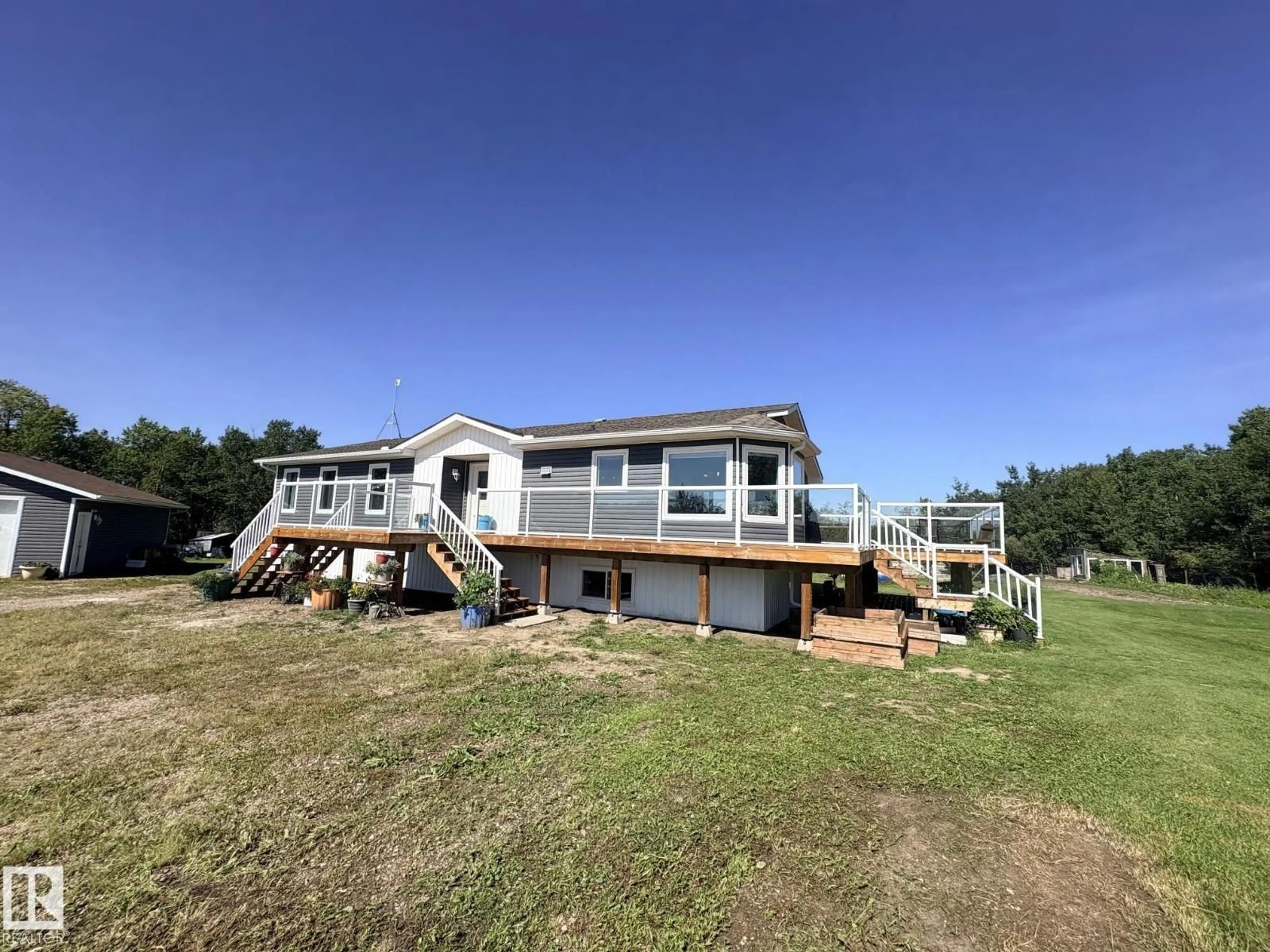 A pic from outside/outdoor area/front of a property/back of a property/a pic from drone, water/lake/river/ocean view for 45512 TOWNSHIP ROAD 604, Rural Bonnyville M.D. Alberta T9N2G6