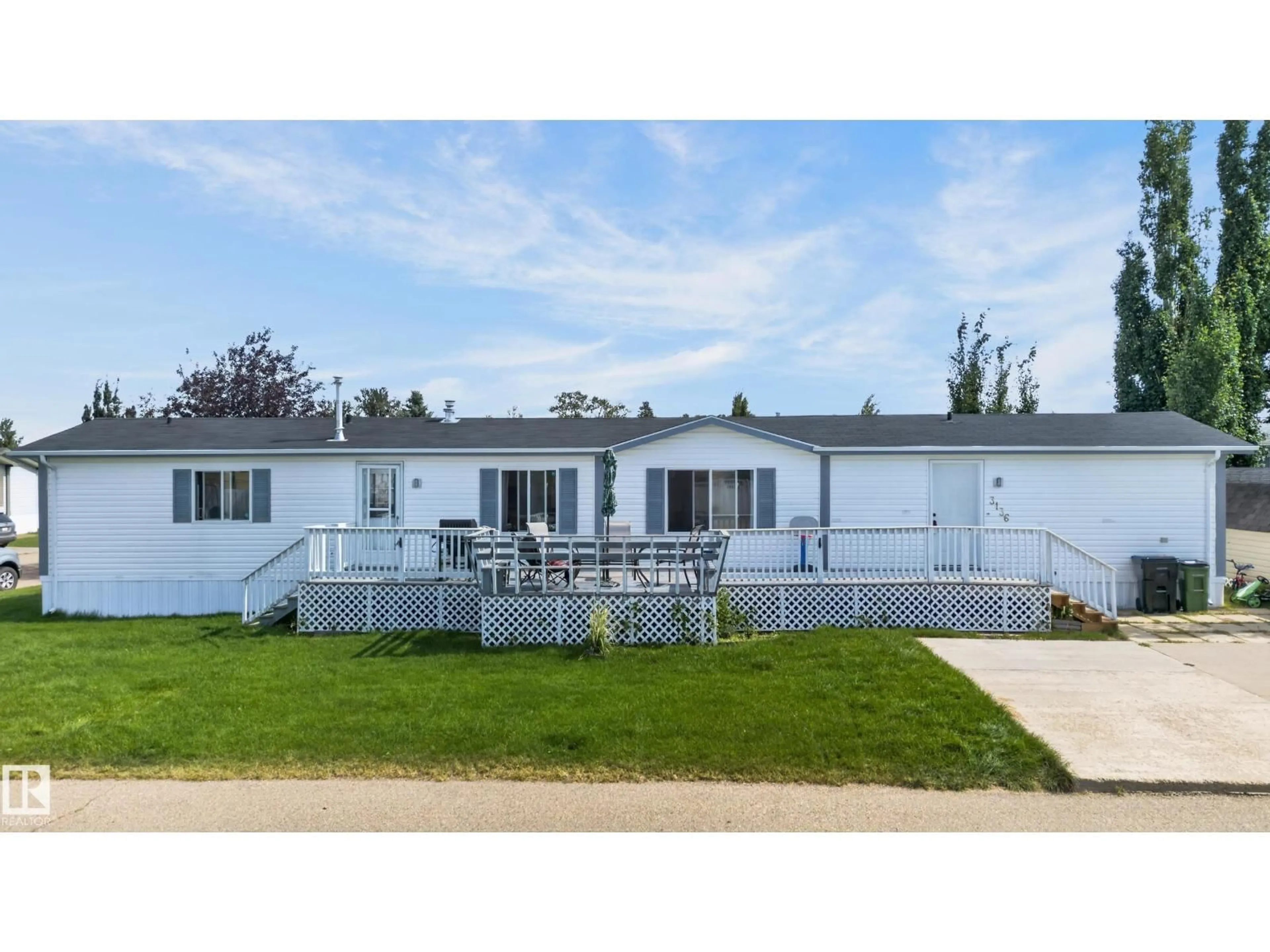Home with vinyl exterior material, street for NW - 3136 LAKEWOOD CR, Edmonton Alberta T5S2C5