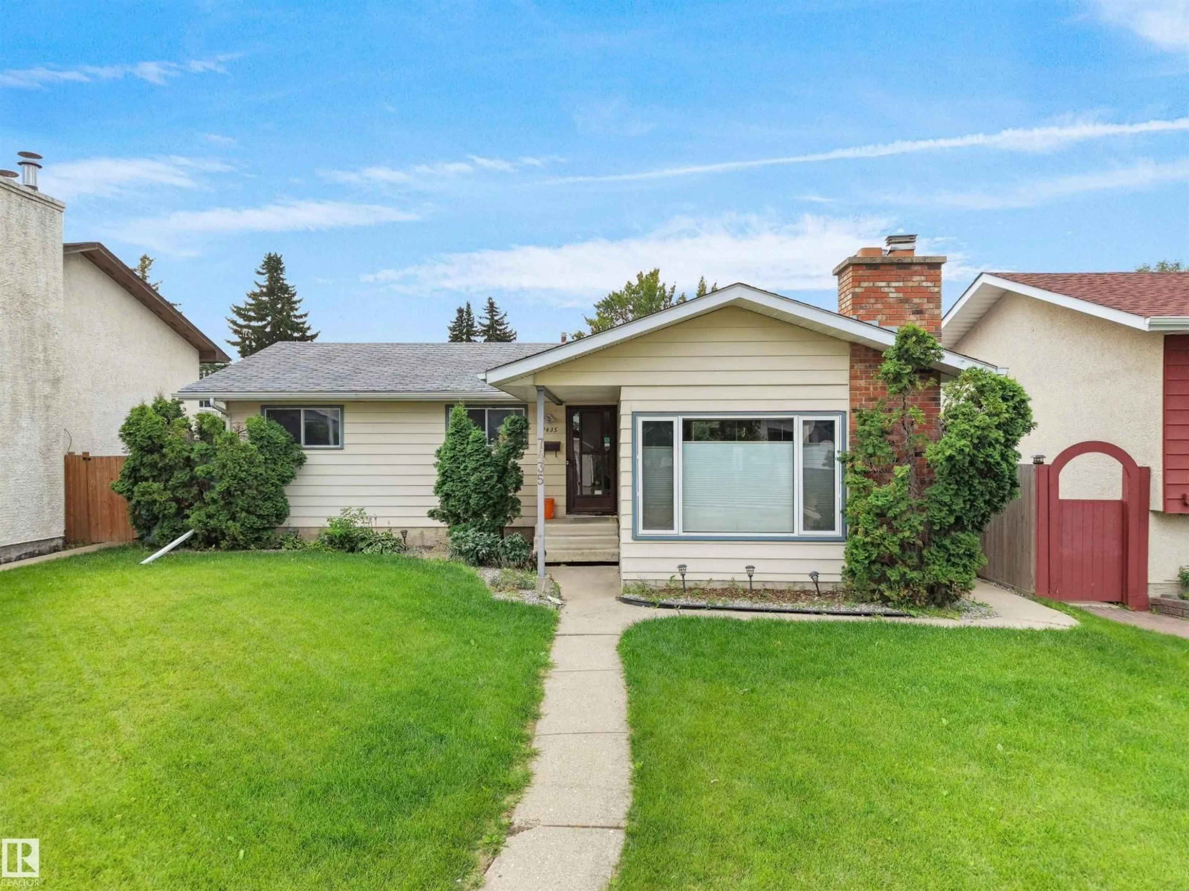 Home with vinyl exterior material, street for 7435 32 AV, Edmonton Alberta T6K1J9