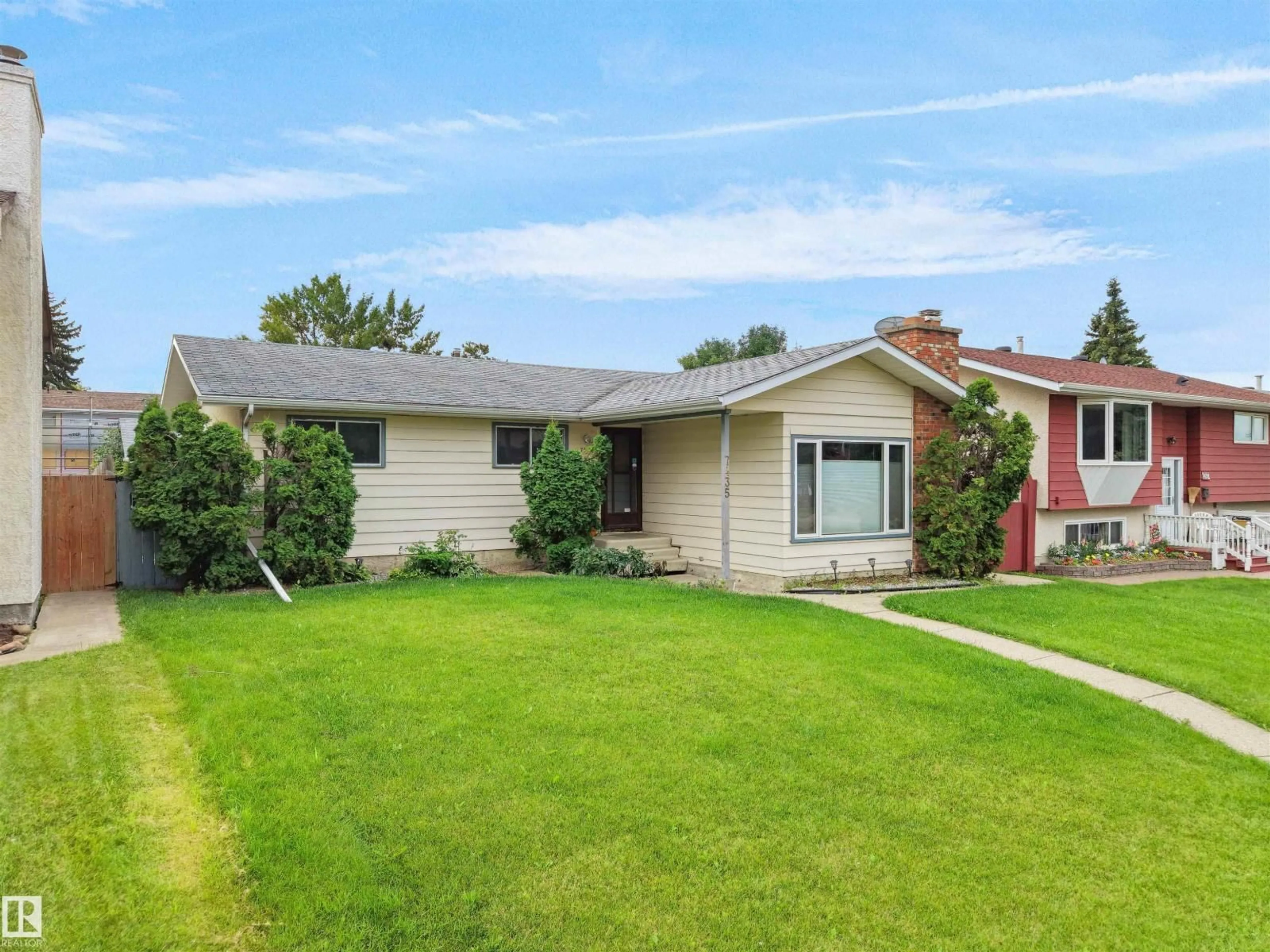 Home with vinyl exterior material, street for 7435 32 AV, Edmonton Alberta T6K1J9