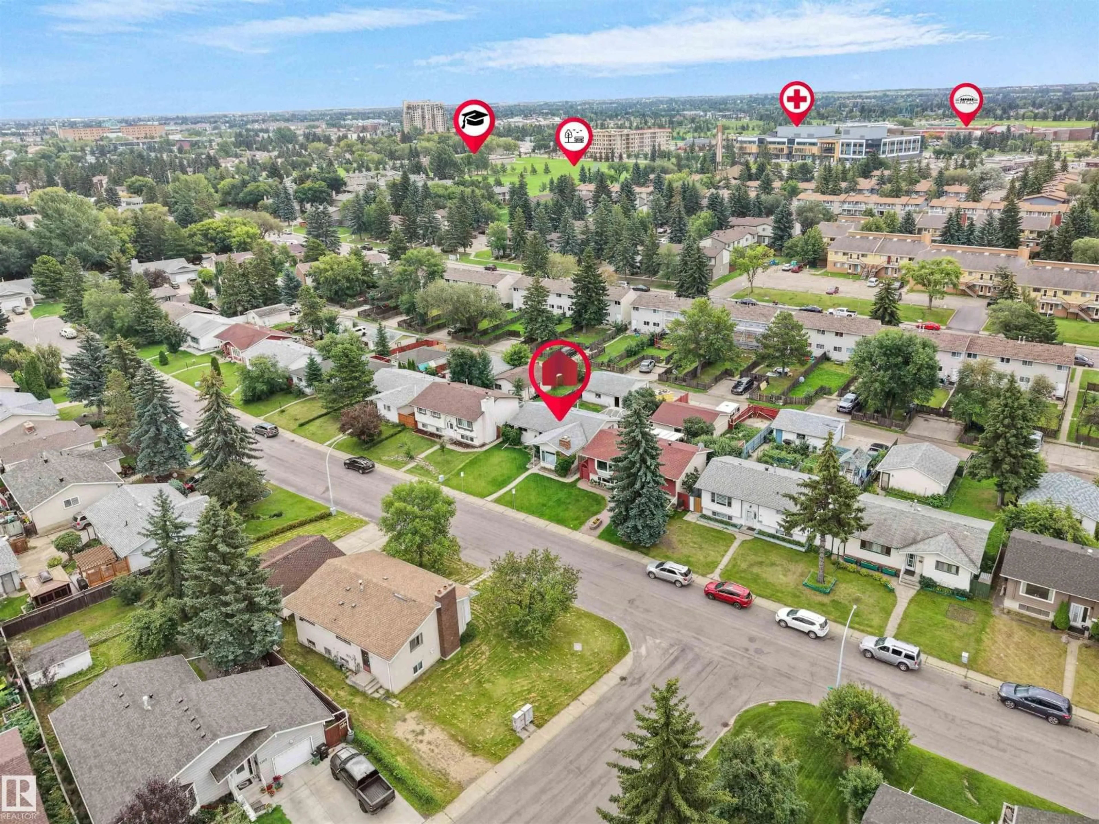 A pic from outside/outdoor area/front of a property/back of a property/a pic from drone, street for 7435 32 AV, Edmonton Alberta T6K1J9