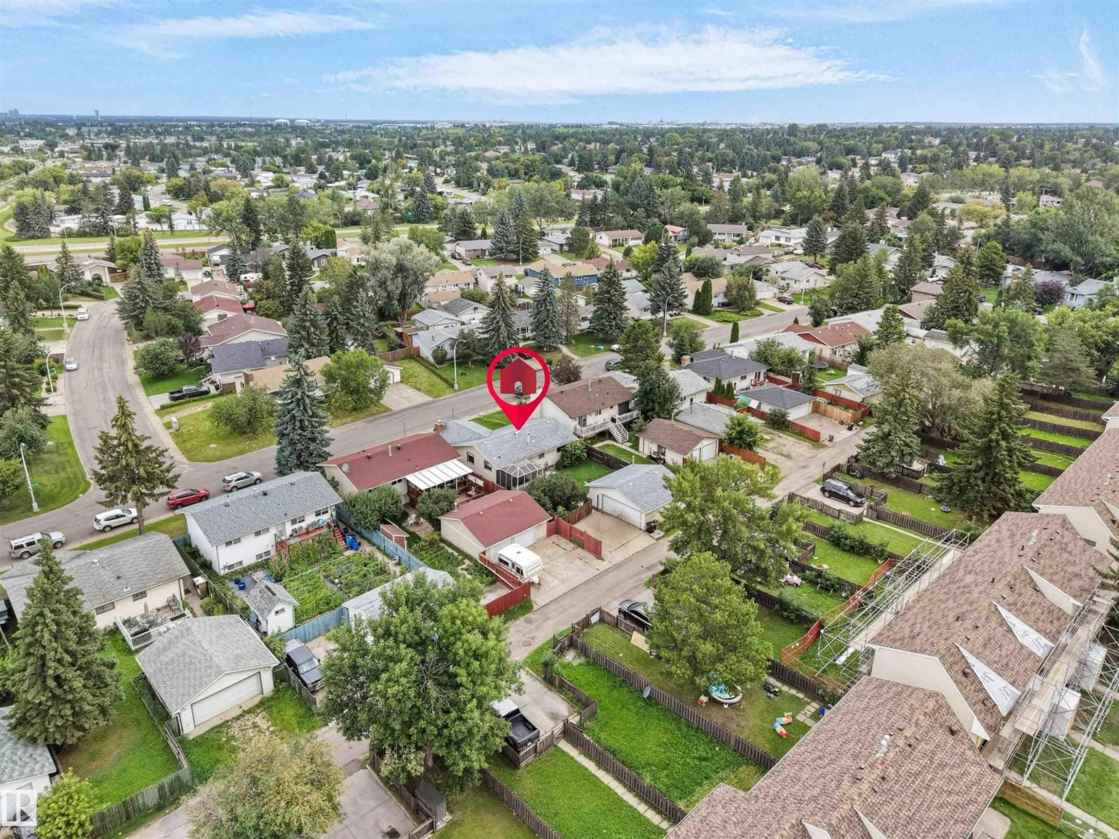 A pic from outside/outdoor area/front of a property/back of a property/a pic from drone, street for 7435 32 AV, Edmonton Alberta T6K1J9