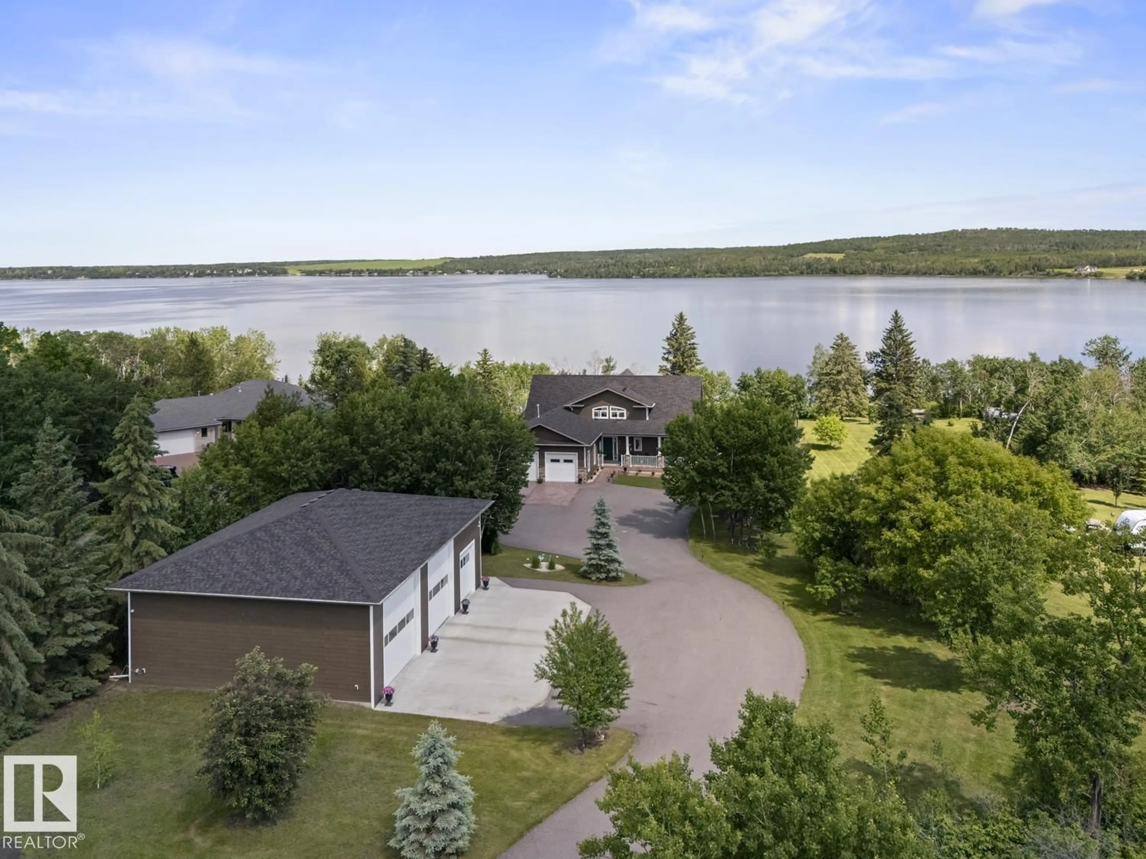 A pic from outside/outdoor area/front of a property/back of a property/a pic from drone, water/lake/river/ocean view for 3 & 4 - 46526 TWP RD 604 A, Rural Bonnyville M.D. Alberta T9N2J6