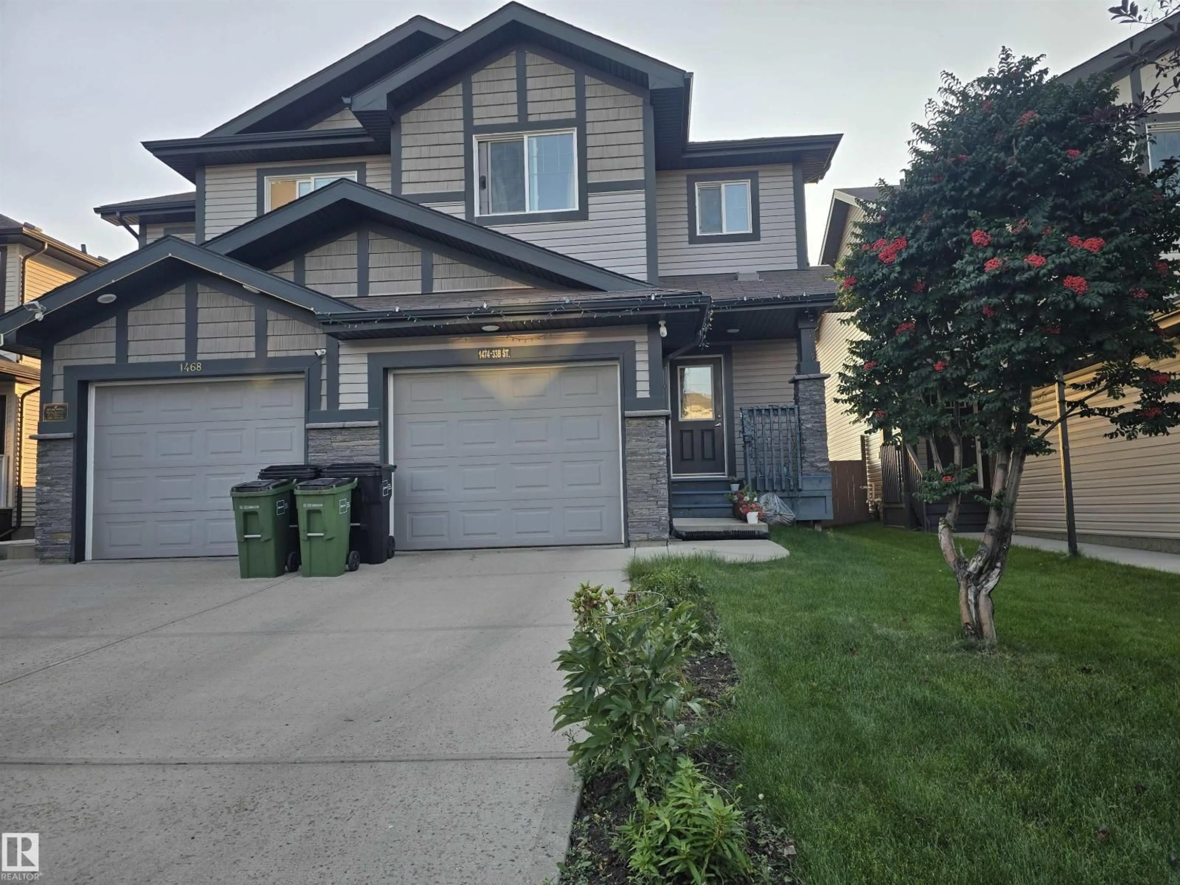 Home with vinyl exterior material, street for NW - 1474 33B ST, Edmonton Alberta T6T0X6