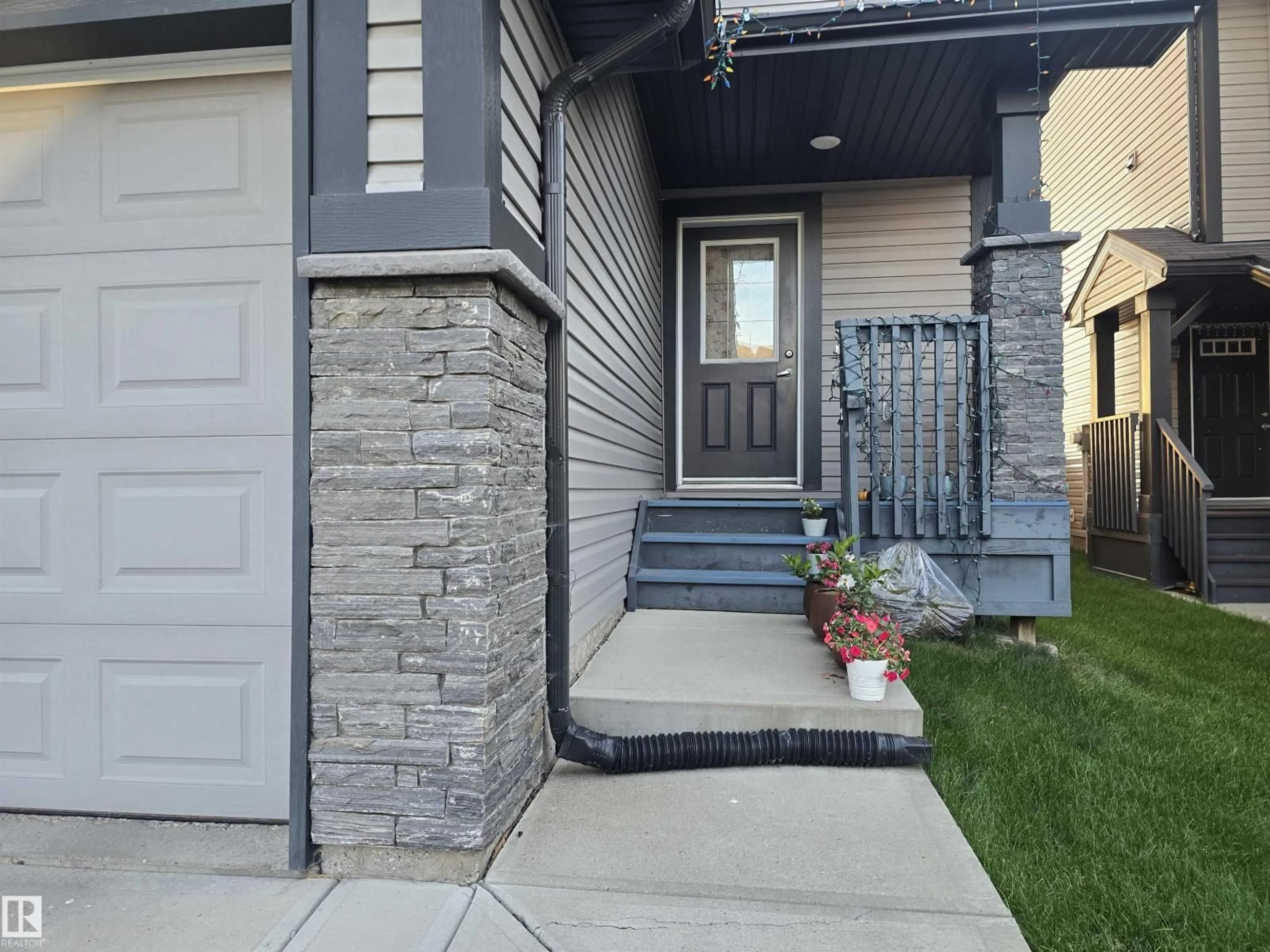 Home with brick exterior material, street for NW - 1474 33B ST, Edmonton Alberta T6T0X6