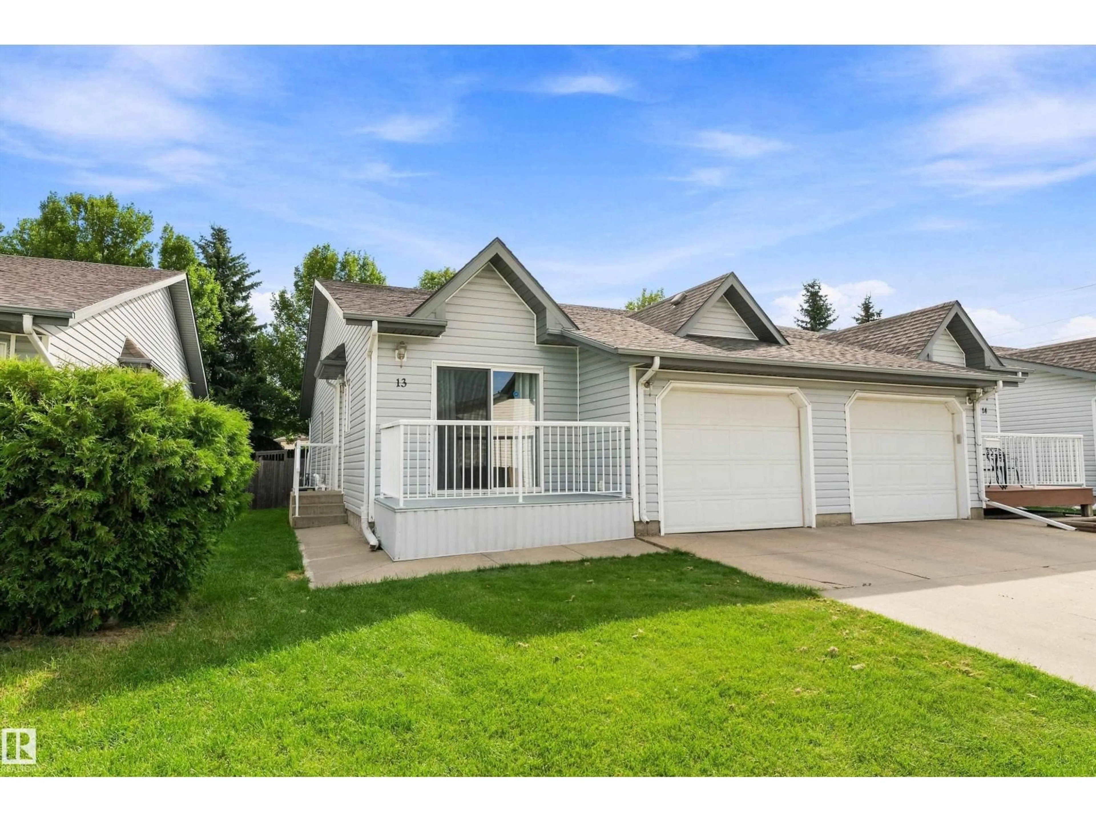 Home with vinyl exterior material, street for #13 - 12603 152 AV, Edmonton Alberta T5X6E8