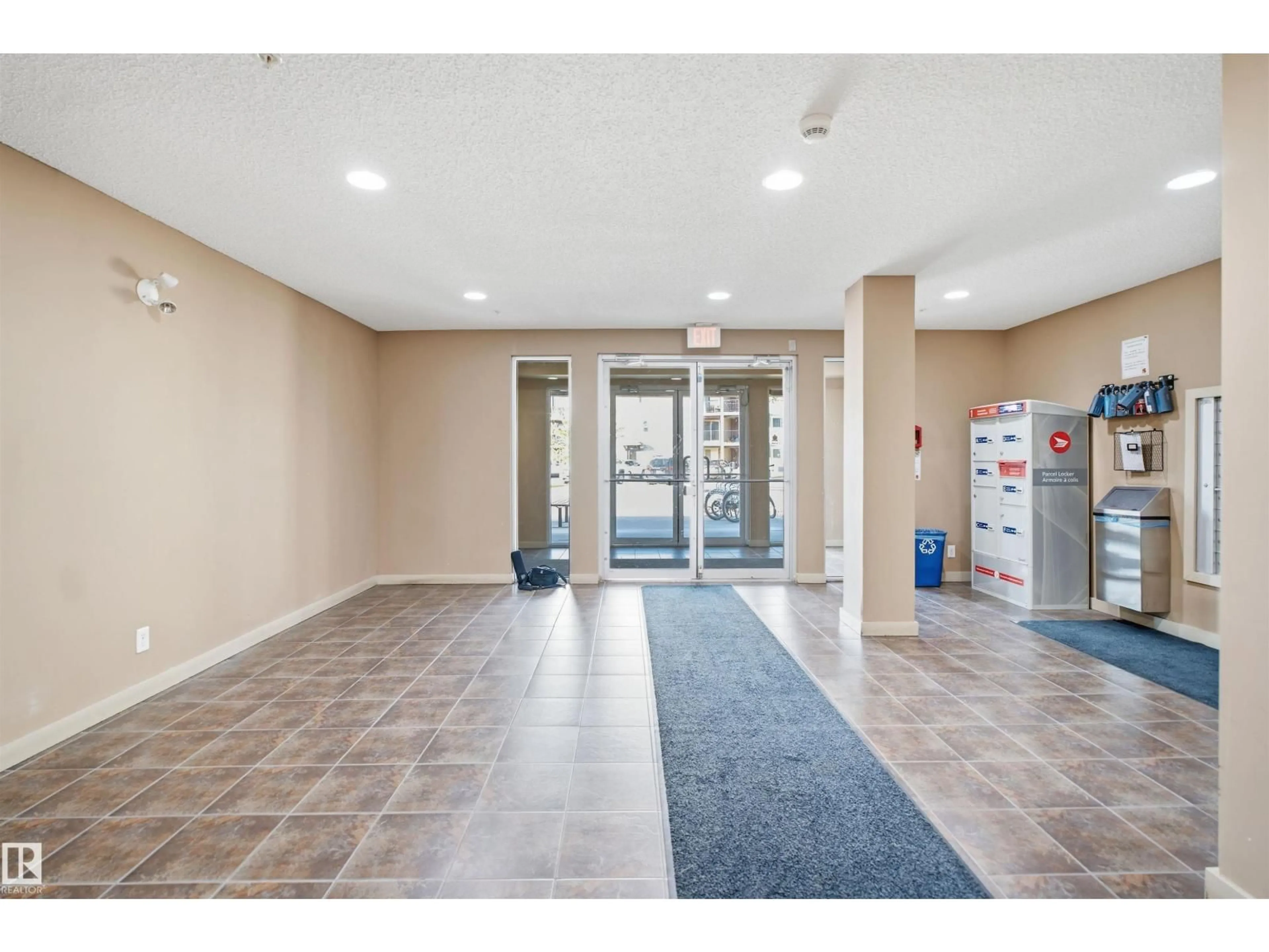 Indoor foyer for #212 - 12035 22 AV, Edmonton Alberta T6W2X9