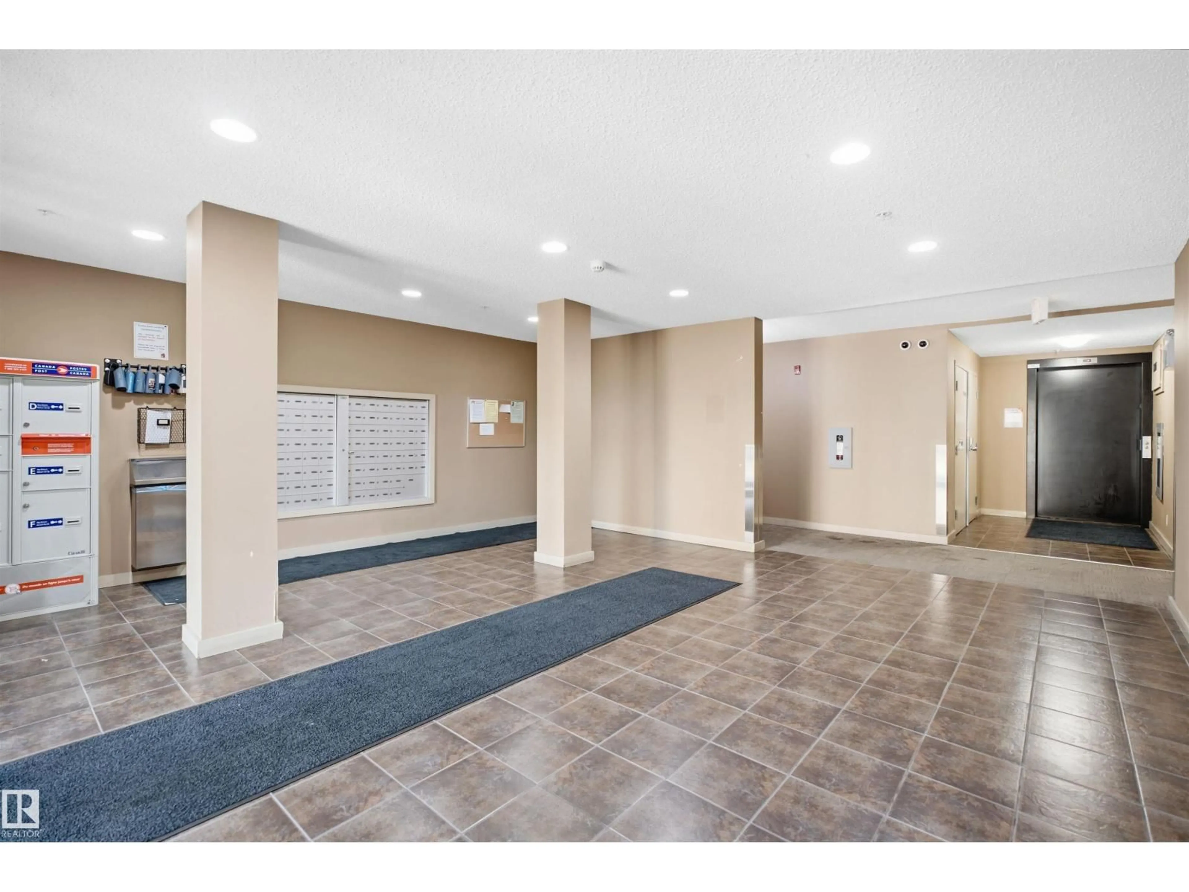Indoor foyer for #212 - 12035 22 AV, Edmonton Alberta T6W2X9