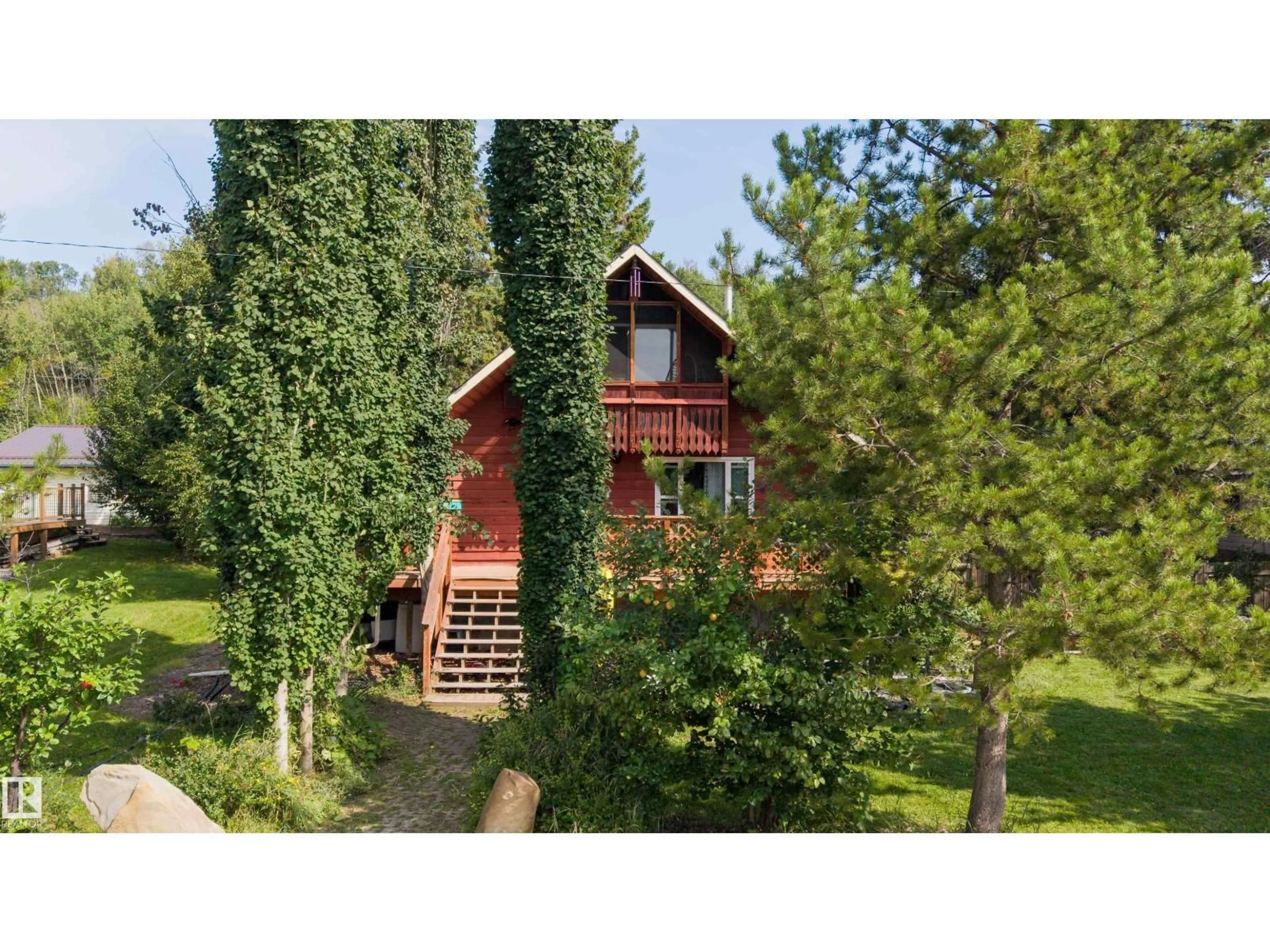 A pic from outside/outdoor area/front of a property/back of a property/a pic from drone, forest/trees view for 12 FIRST AVE, Rural Parkland County Alberta T0E0V0