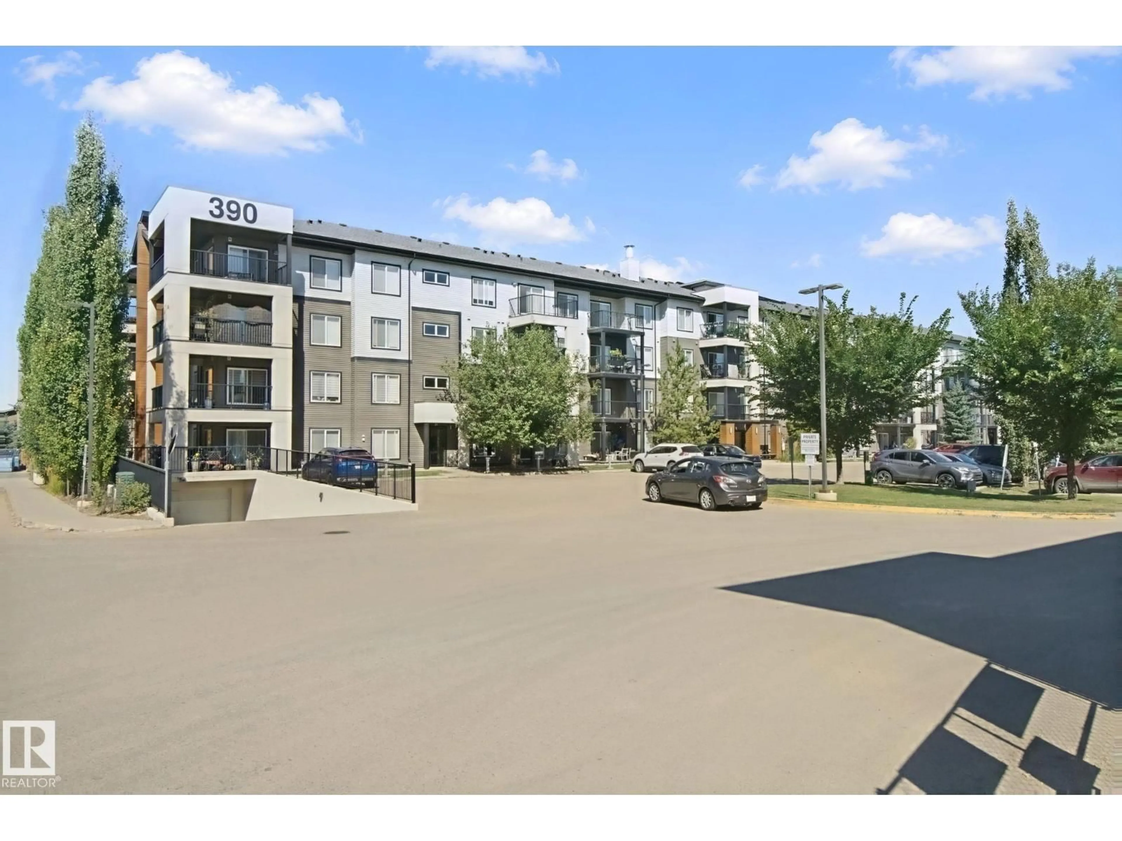 A pic from outside/outdoor area/front of a property/back of a property/a pic from drone, street for #330 - 390 WINDERMERE RD, Edmonton Alberta T6W0R1