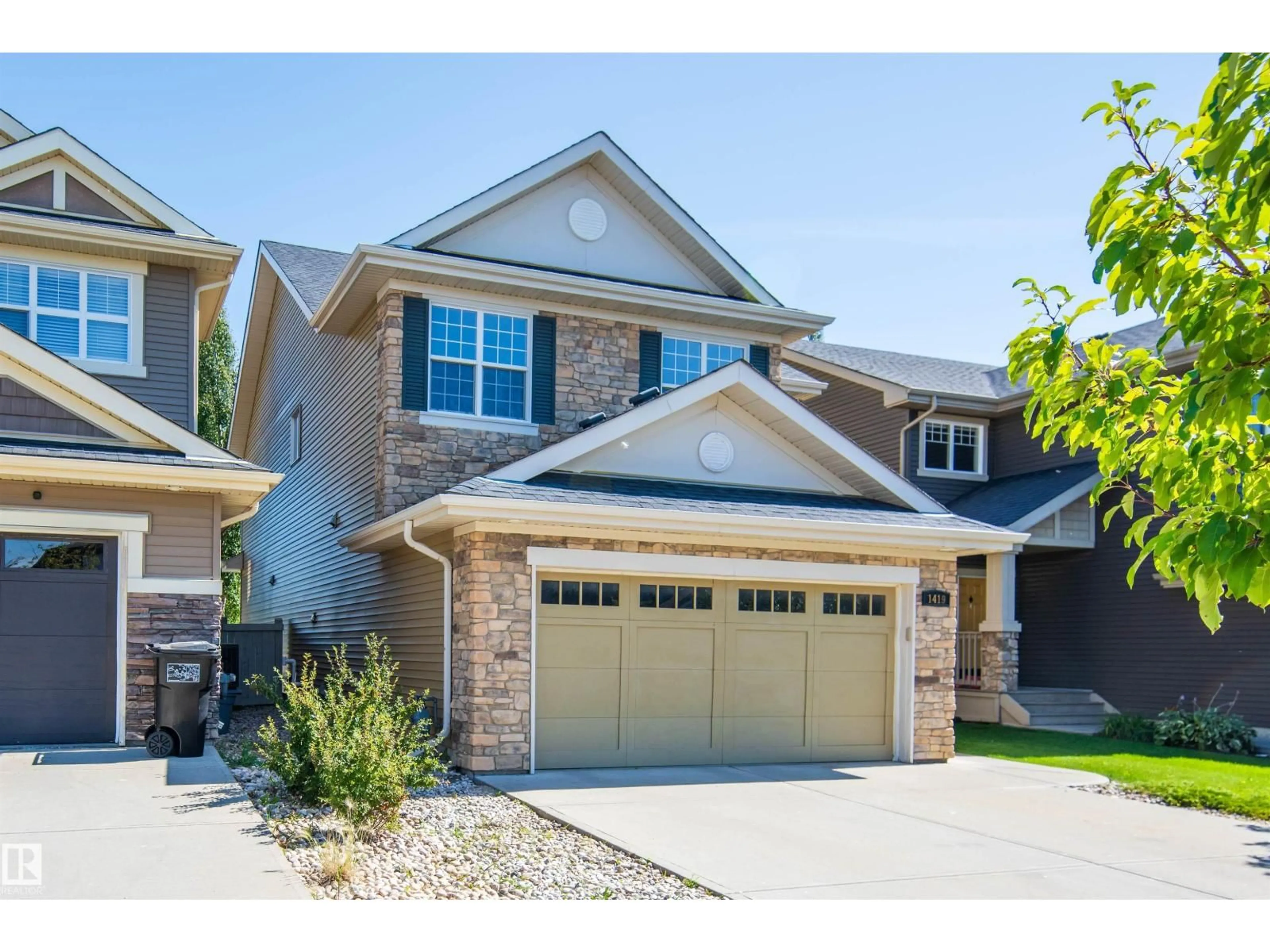 Home with brick exterior material, street for 1419 CHAHLEY PL, Edmonton Alberta T6M0J3