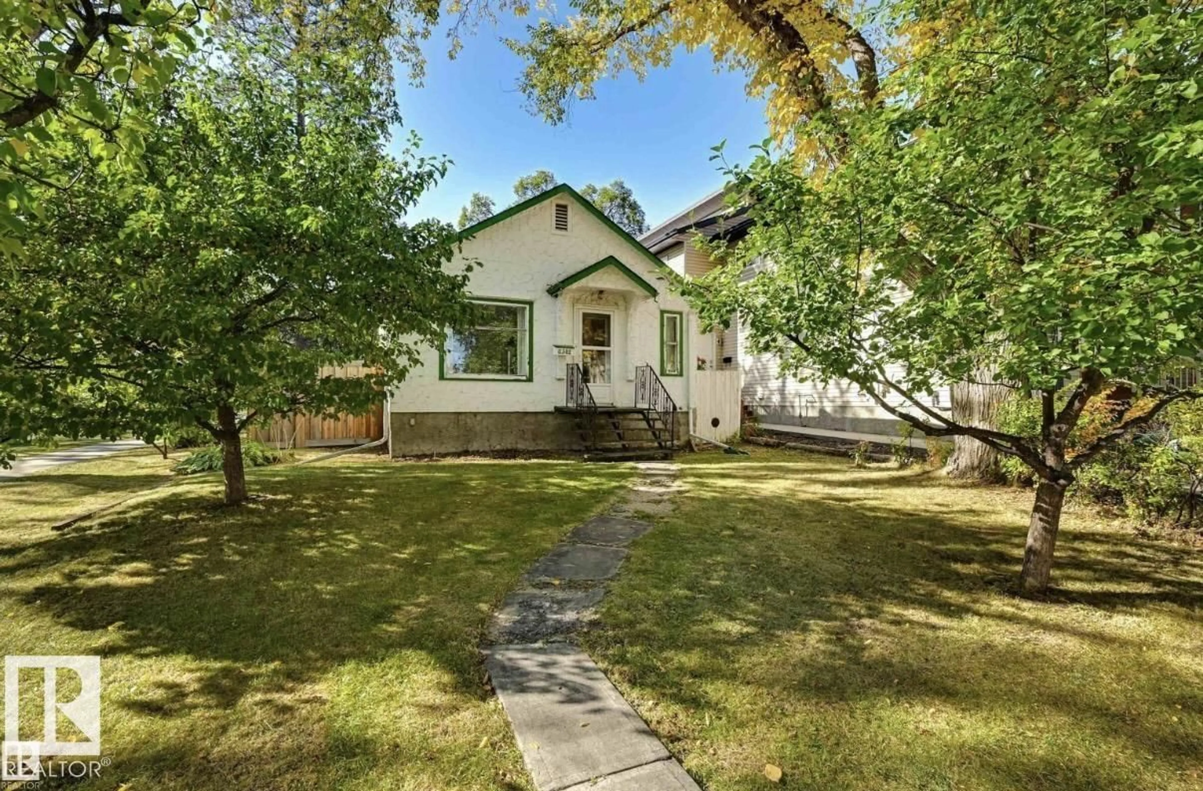 A pic from outside/outdoor area/front of a property/back of a property/a pic from drone, street for NW - 11502 122 ST, Edmonton Alberta T5M0C1