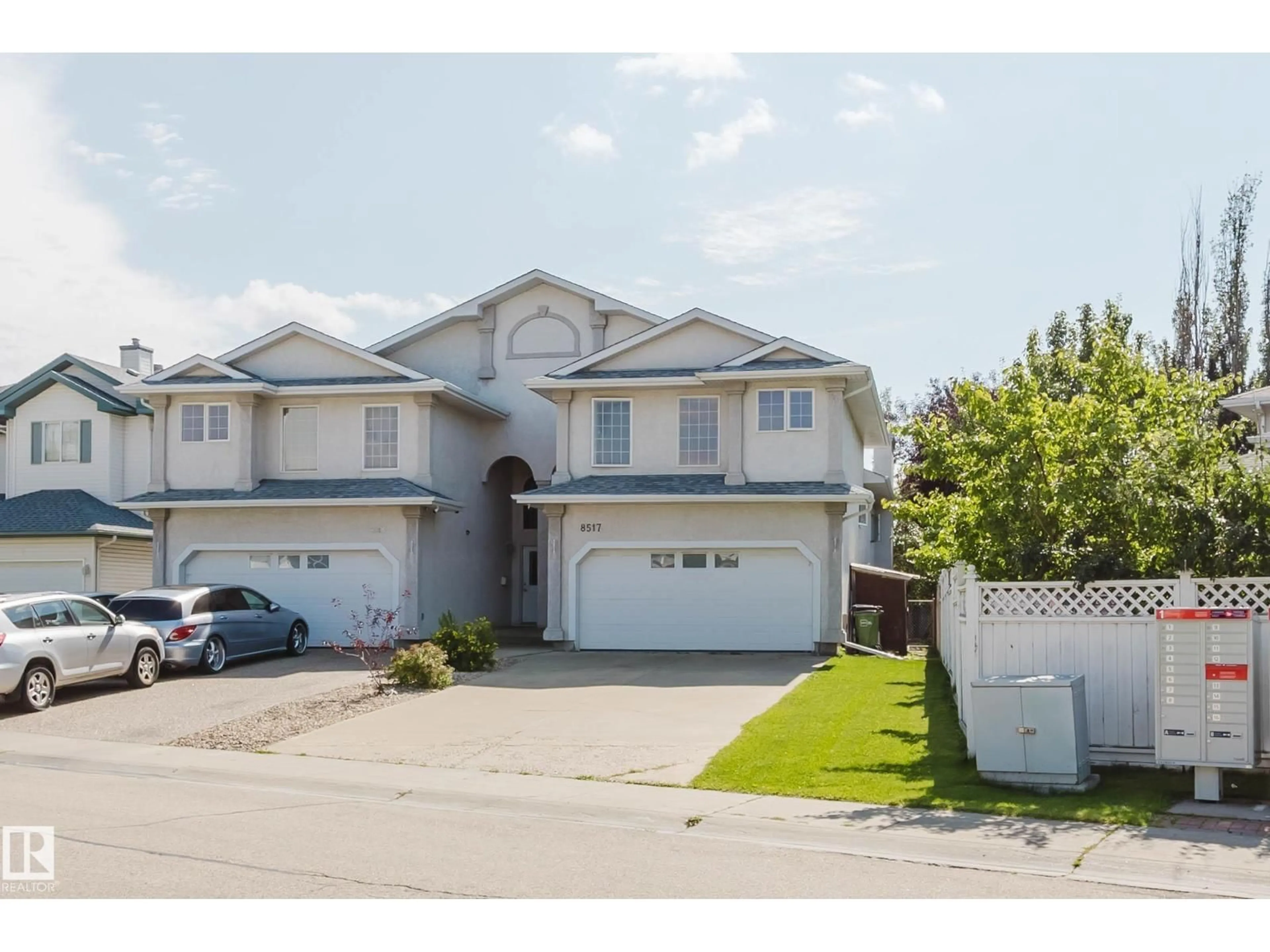 A pic from outside/outdoor area/front of a property/back of a property/a pic from drone, street for 8517 156 AV, Edmonton Alberta T5Z3B4