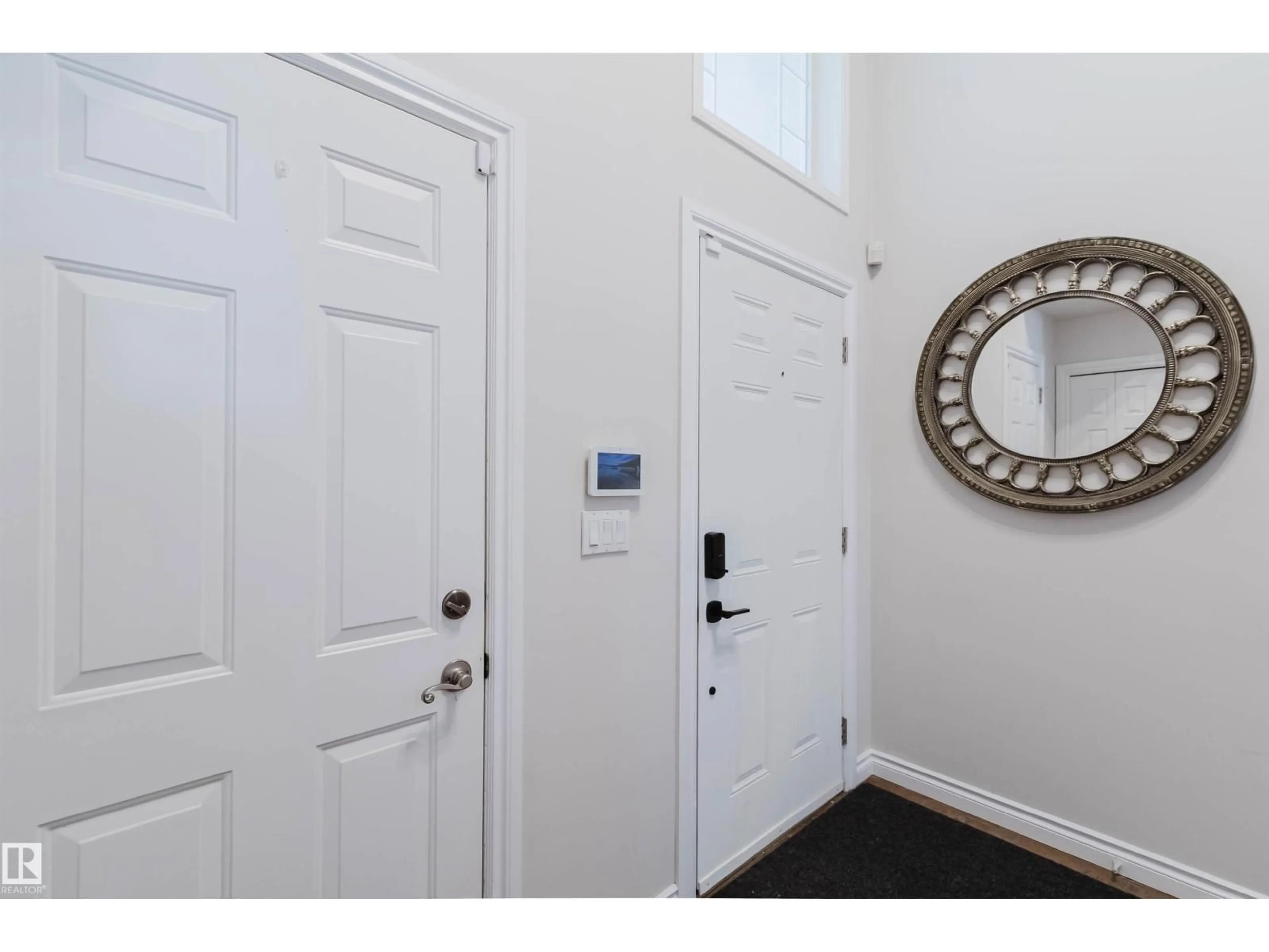 Indoor entryway for 8517 156 AV, Edmonton Alberta T5Z3B4