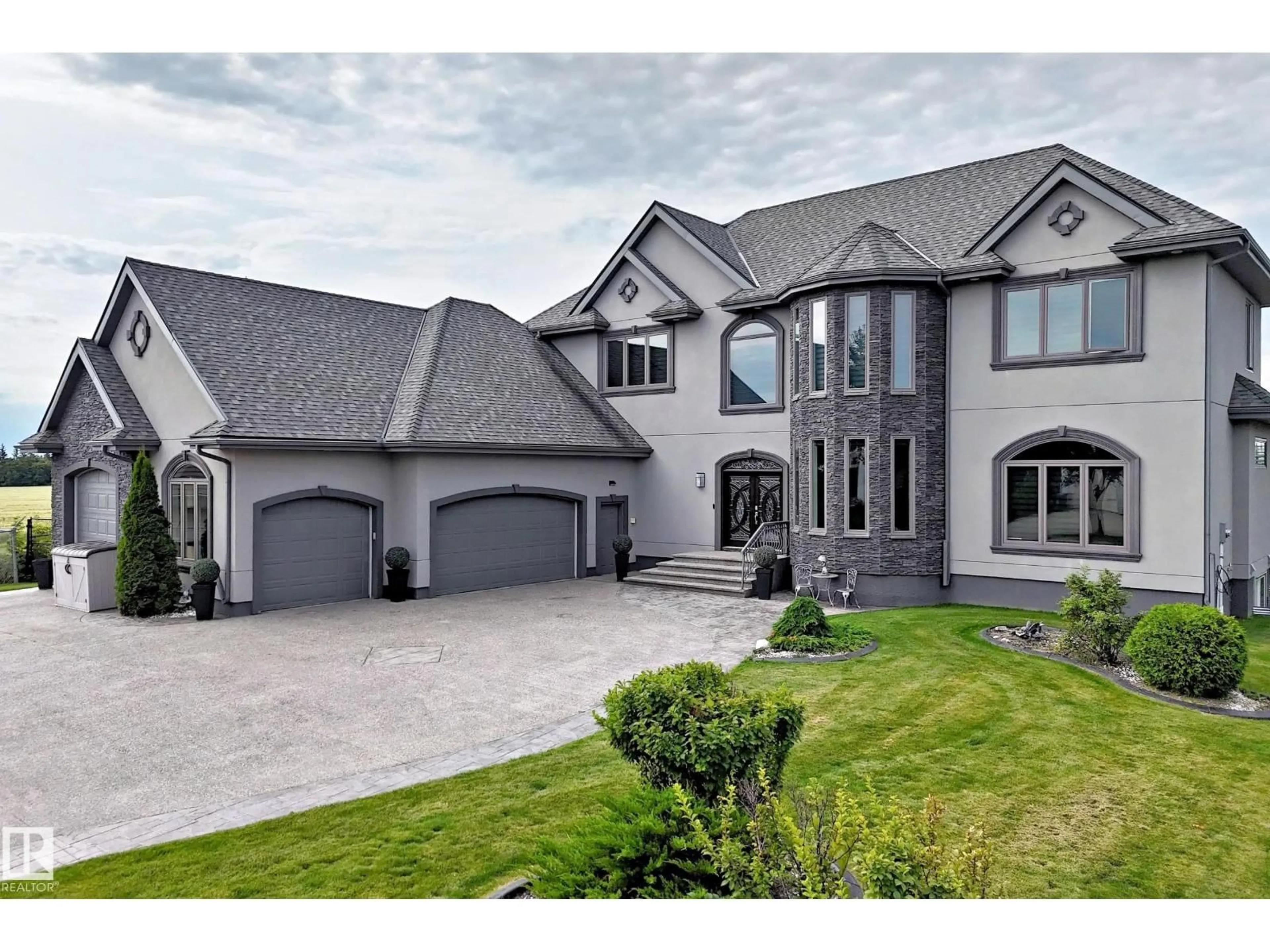 Home with brick exterior material, street for 101 - 54302 RGE ROAD 250, Rural Sturgeon County Alberta T8T0C9