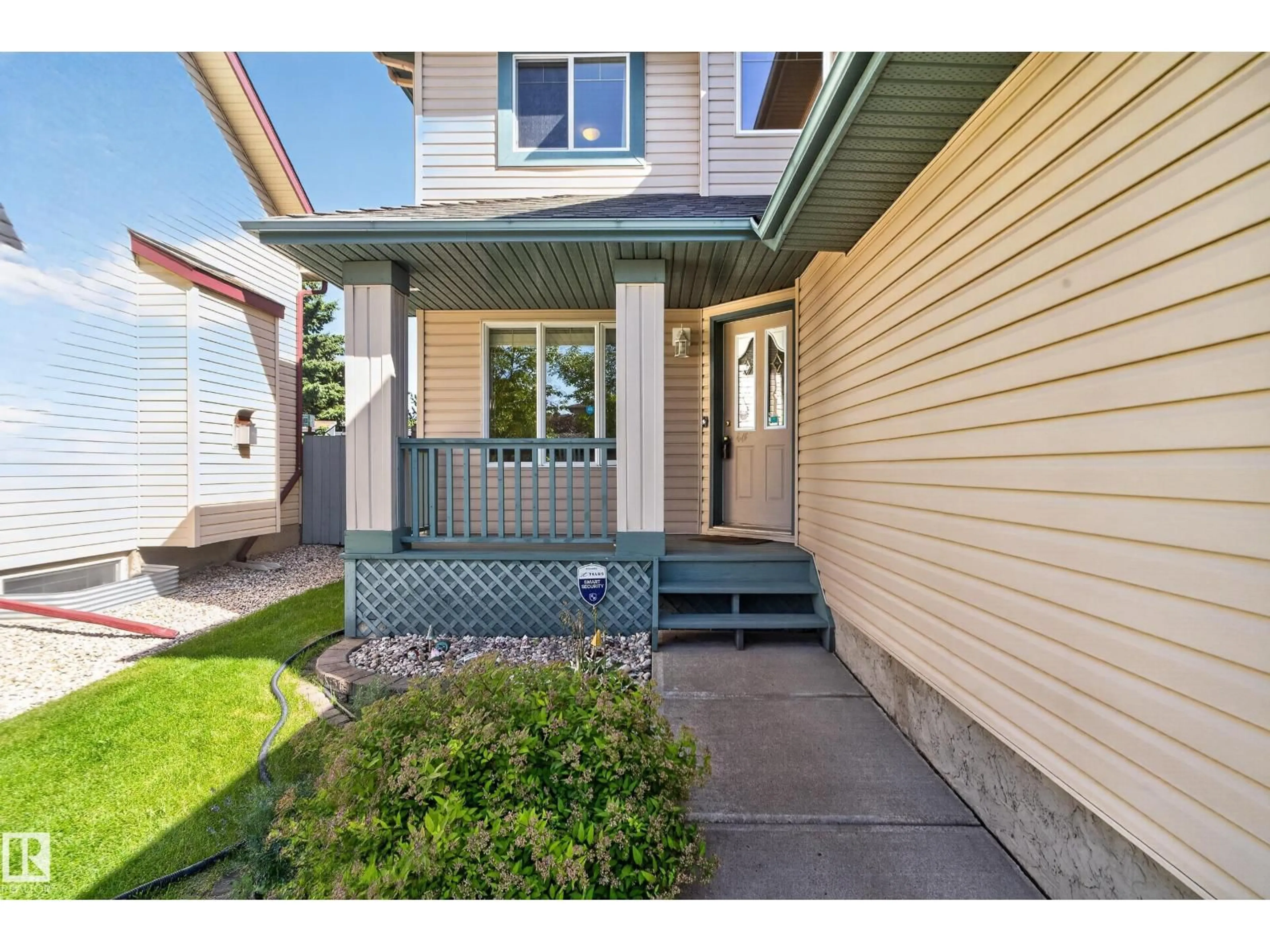 Home with vinyl exterior material, street for 2035 BLACKMUD CREEK DR, Edmonton Alberta T6W1E7