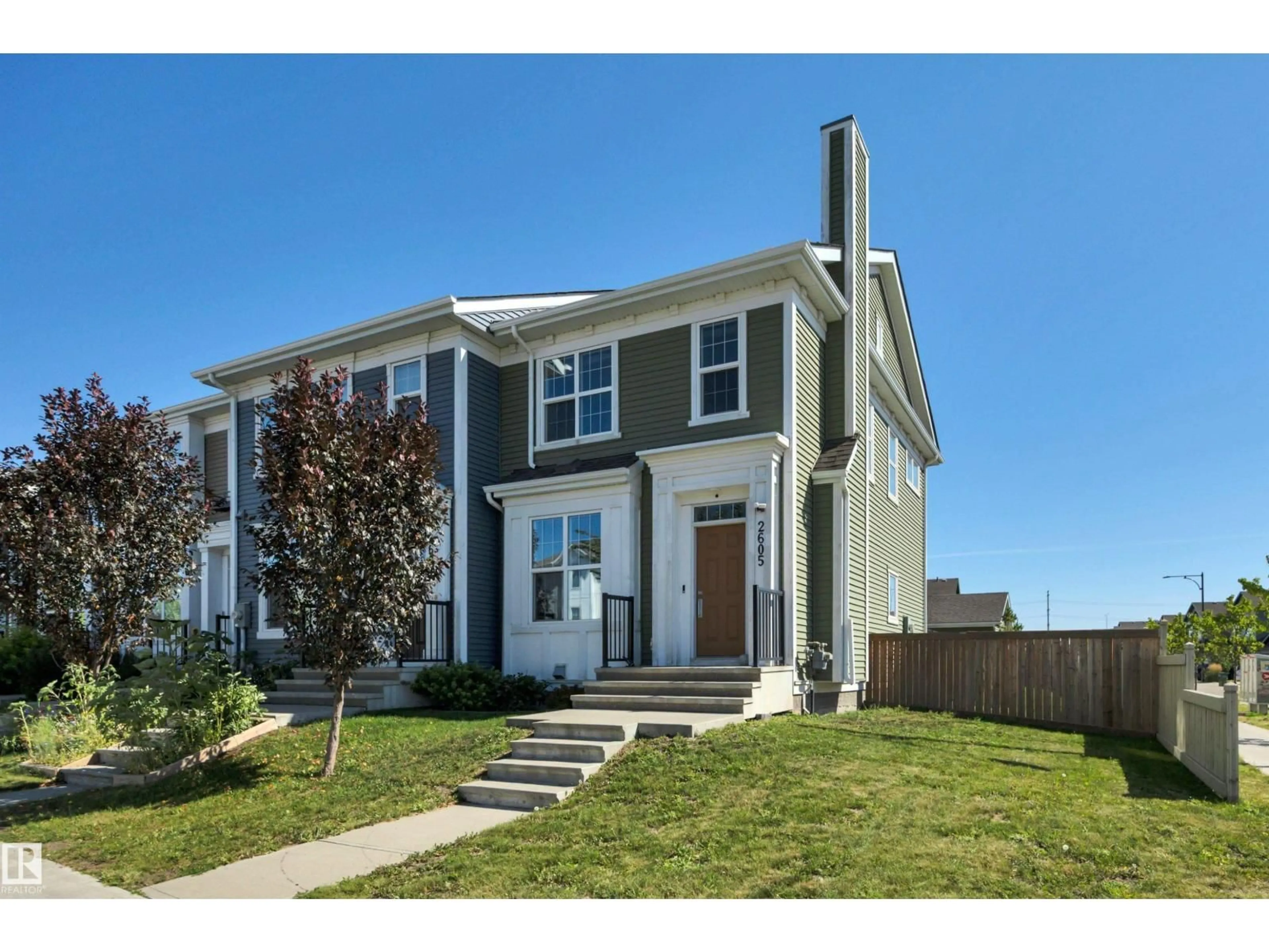 Home with vinyl exterior material, street for 2605 MAPLE WY, Edmonton Alberta T6T2K1