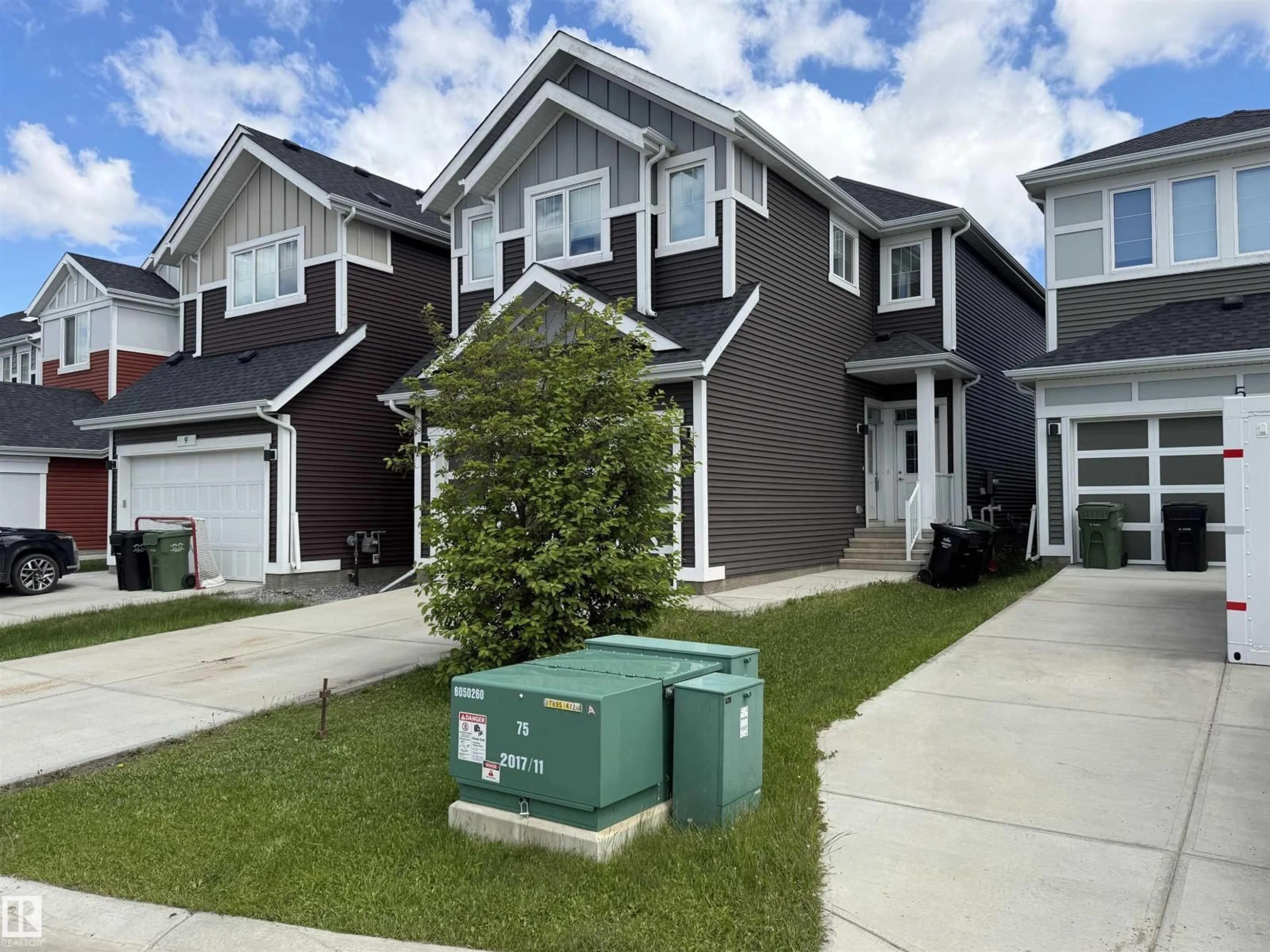 Home with vinyl exterior material, street for 7 STOUT PL, Leduc Alberta T9E1K4