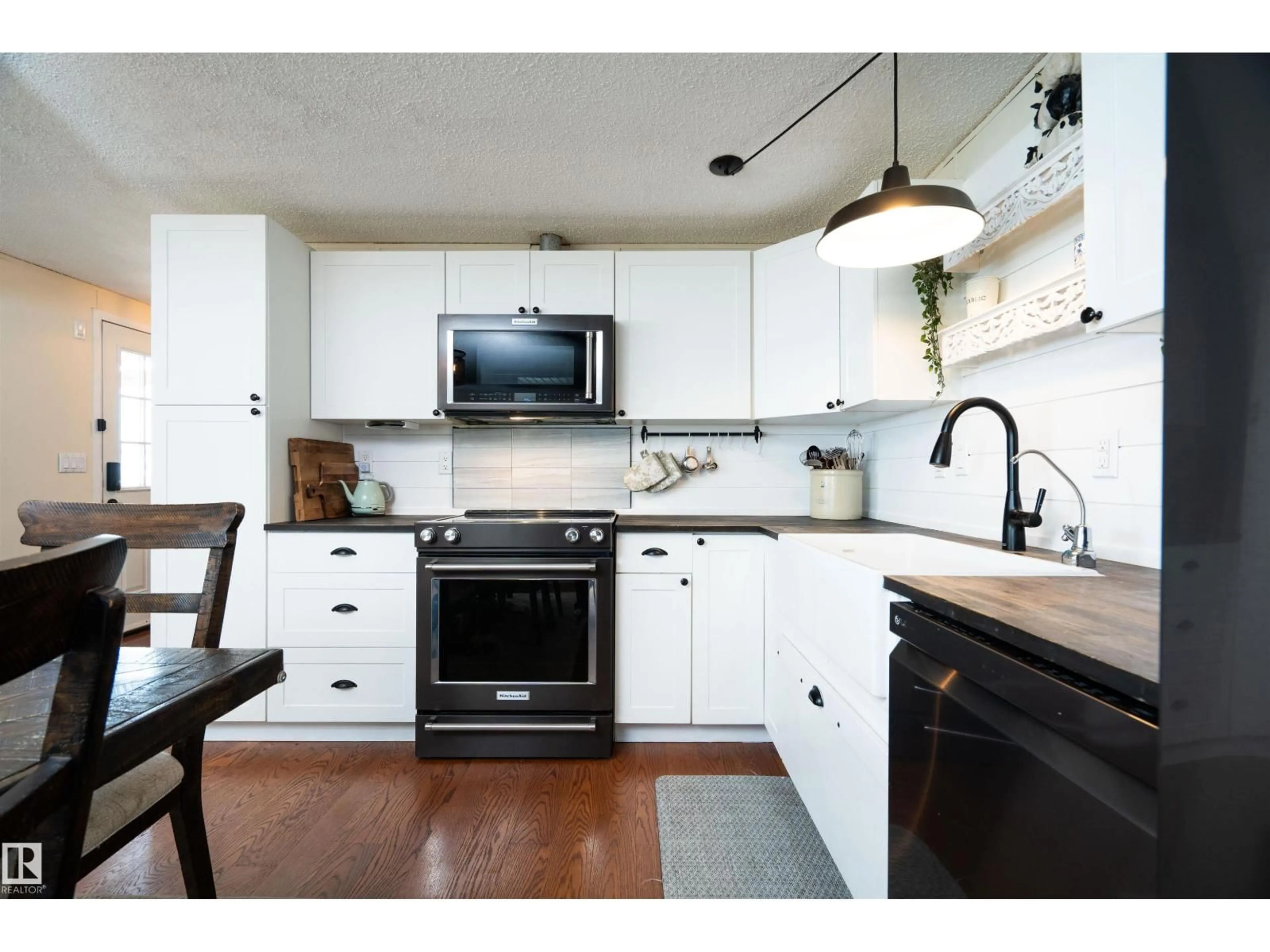 Open concept kitchen, wood/laminate floor for 1215 LAKE VISTA CRESCENT, Sherwood Park Alberta T8H1K5