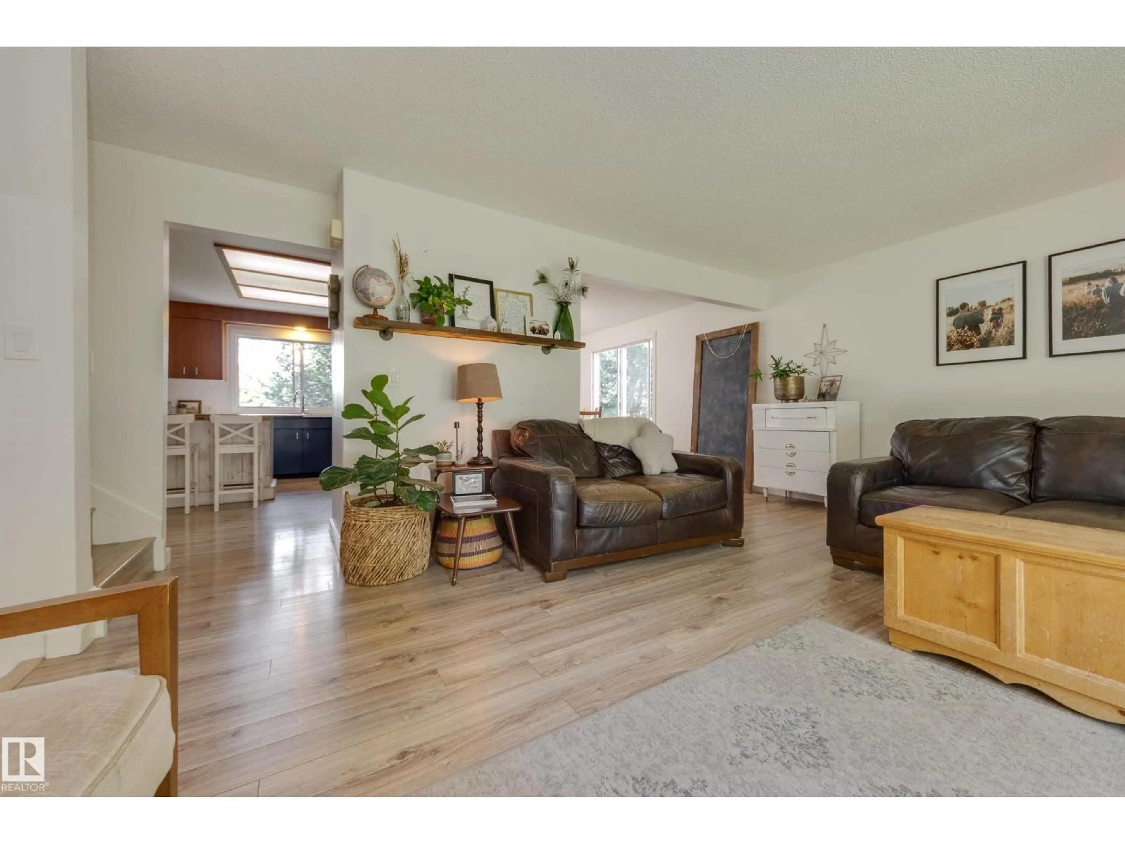 Living room with furniture, wood/laminate floor for 77 BEACON CR, St. Albert Alberta T8N0A4