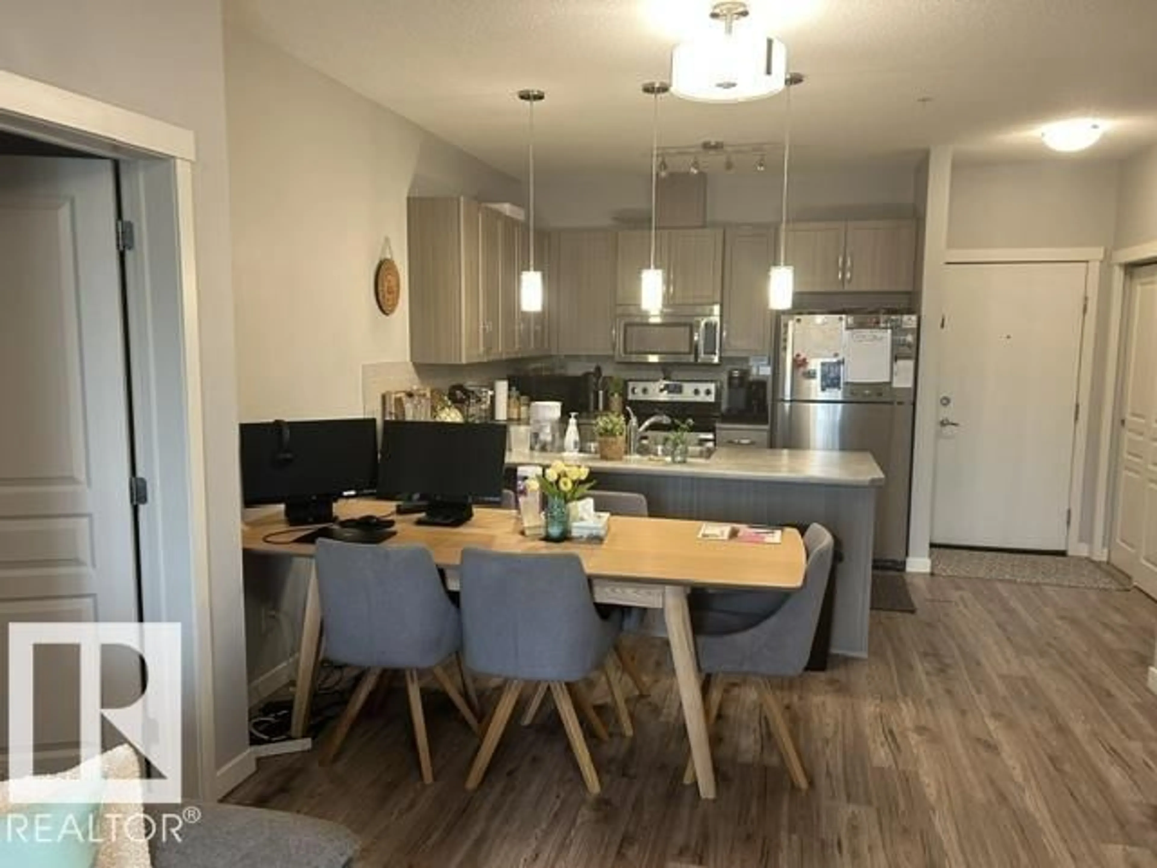 Open concept kitchen, wood/laminate floor for #208 - 812 WELSH DR, Edmonton Alberta T6X1Y7