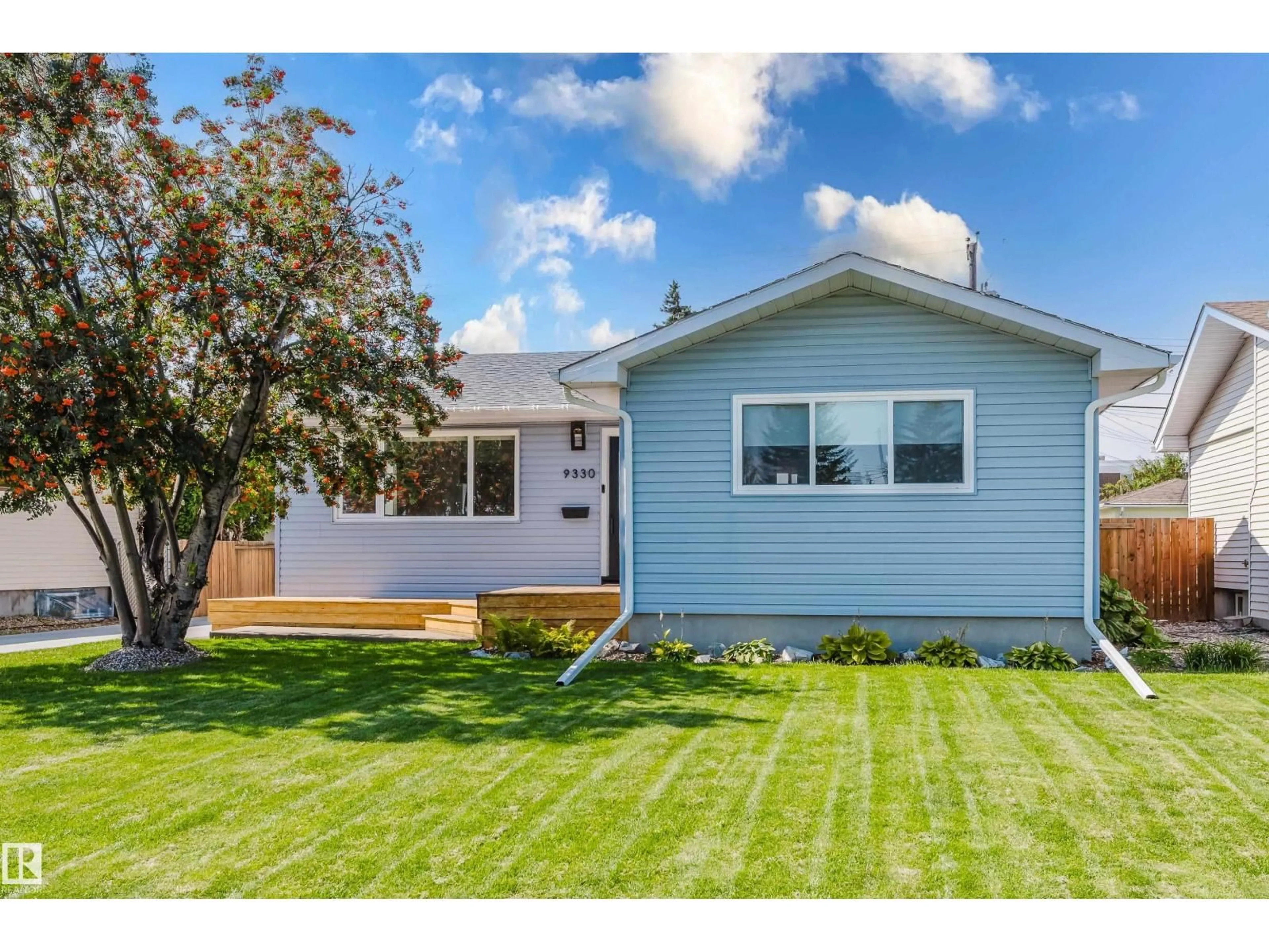 Home with vinyl exterior material, street for 9330 162 ST, Edmonton Alberta T5R2M9