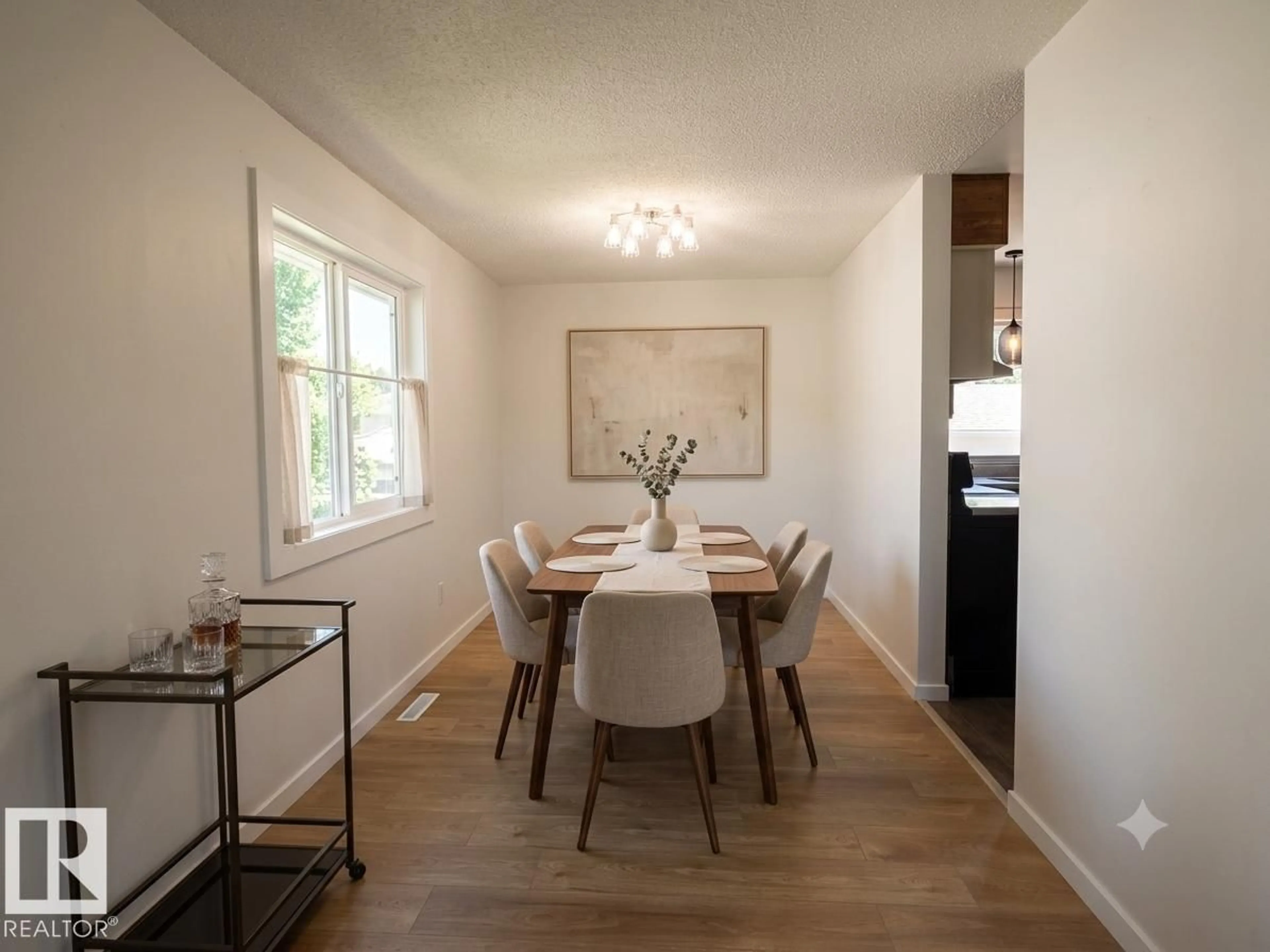 Dining room, wood/laminate floor for 4803 54A ST, Bonnyville Town Alberta T9N1Z3