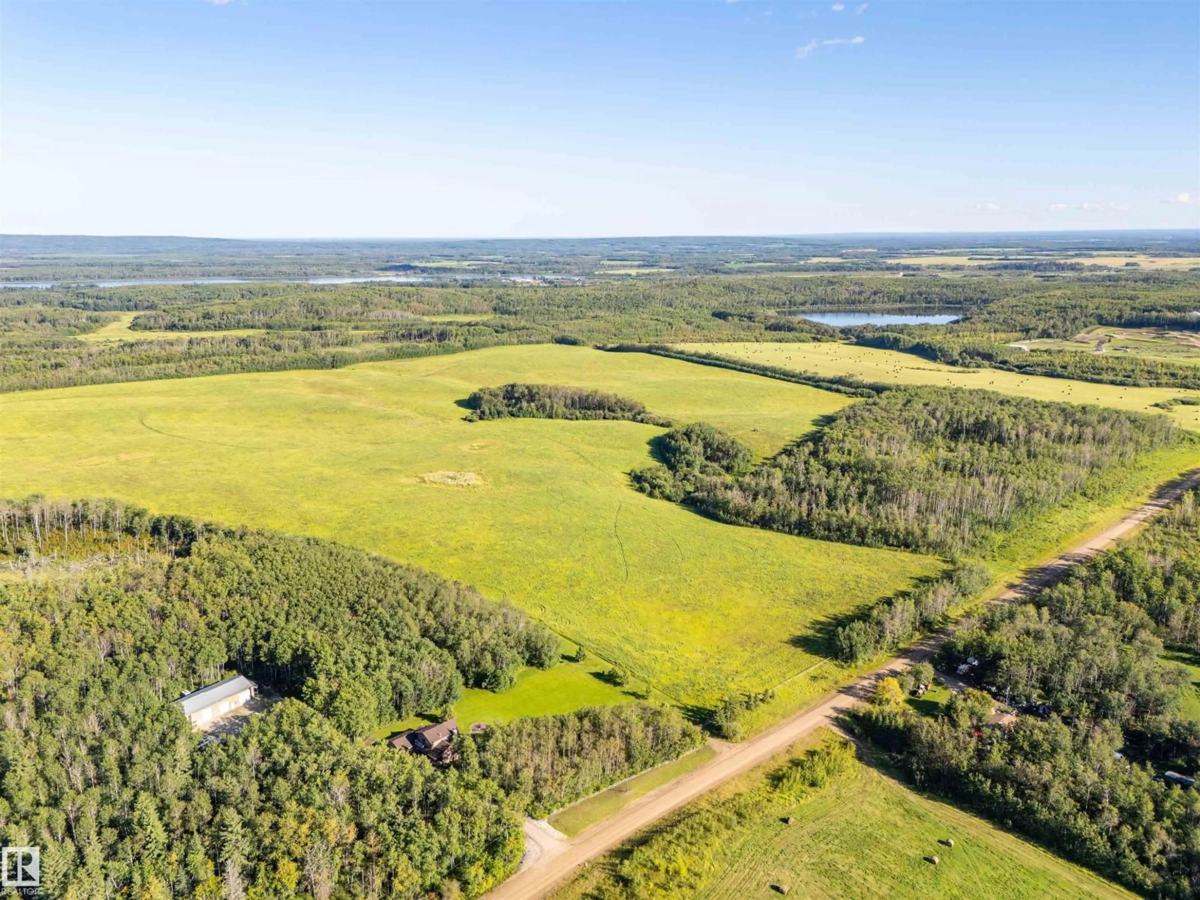 A pic from outside/outdoor area/front of a property/back of a property/a pic from drone, water/lake/river/ocean view for 7812 16 ST, Cold Lake Alberta T9M1B5