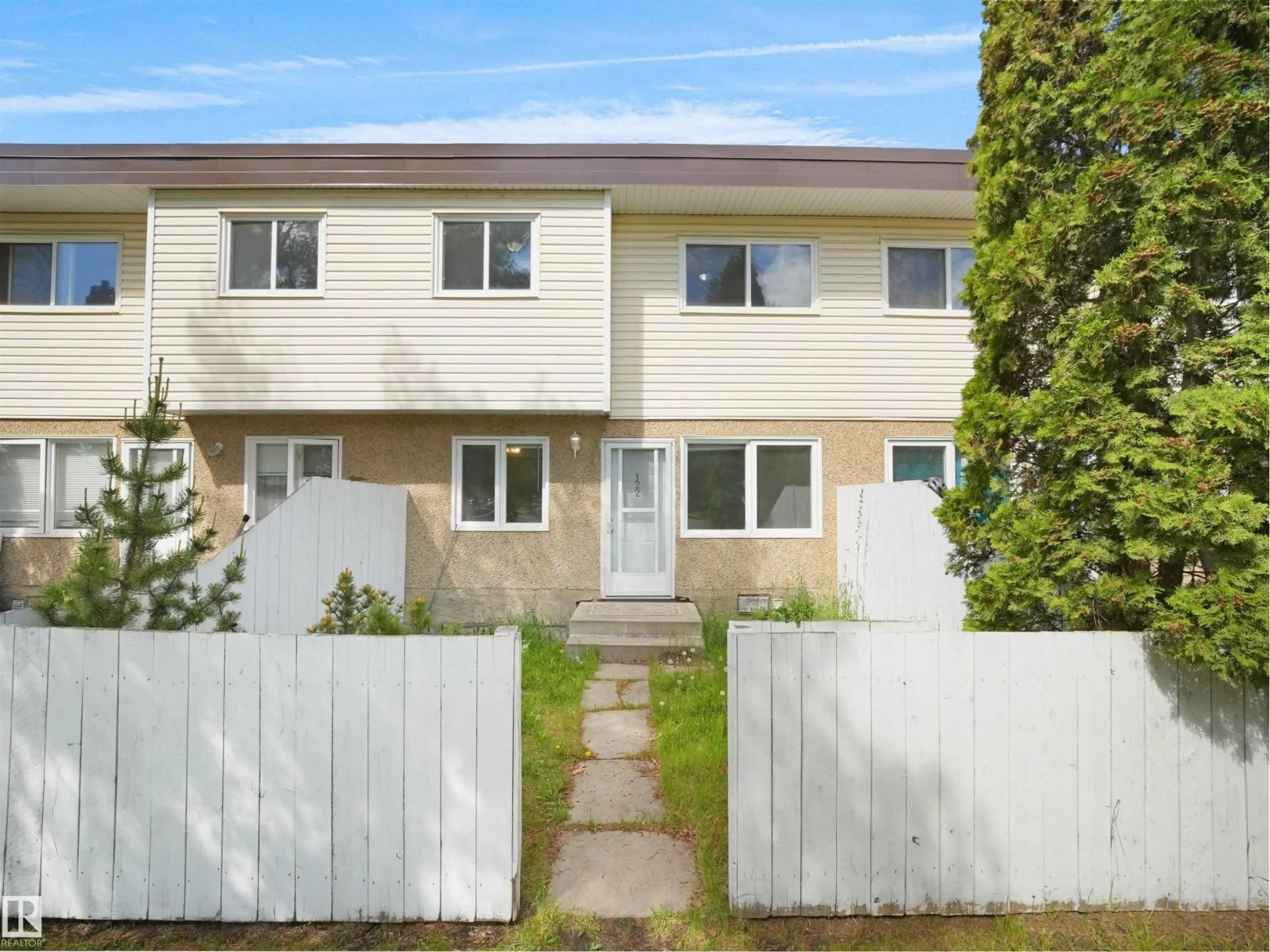 Home with vinyl exterior material, street for 122 16340 109 ST NW, Edmonton Alberta T5X2T4