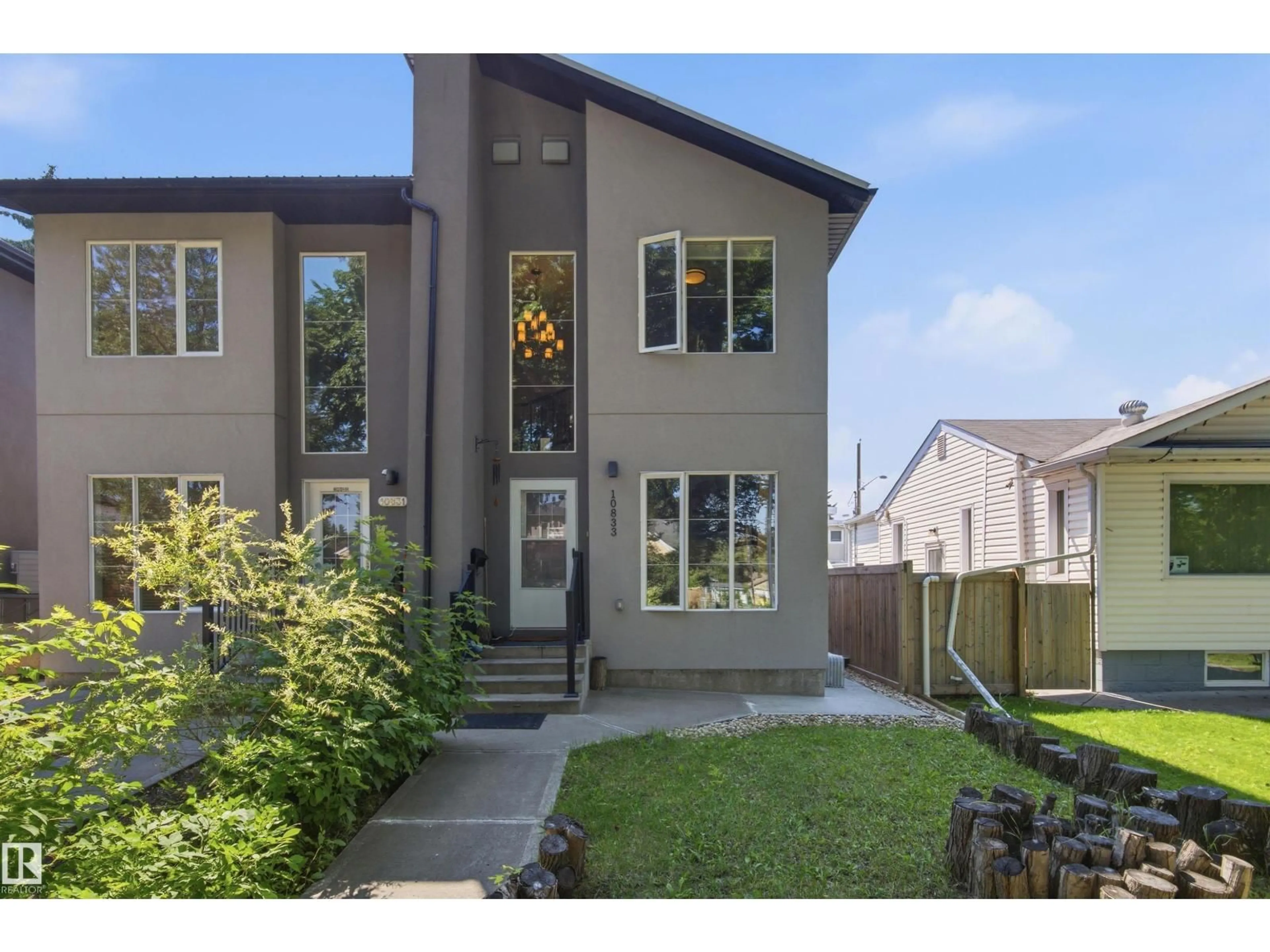 Home with vinyl exterior material, street for 10833 63 AV, Edmonton Alberta T6H1P9