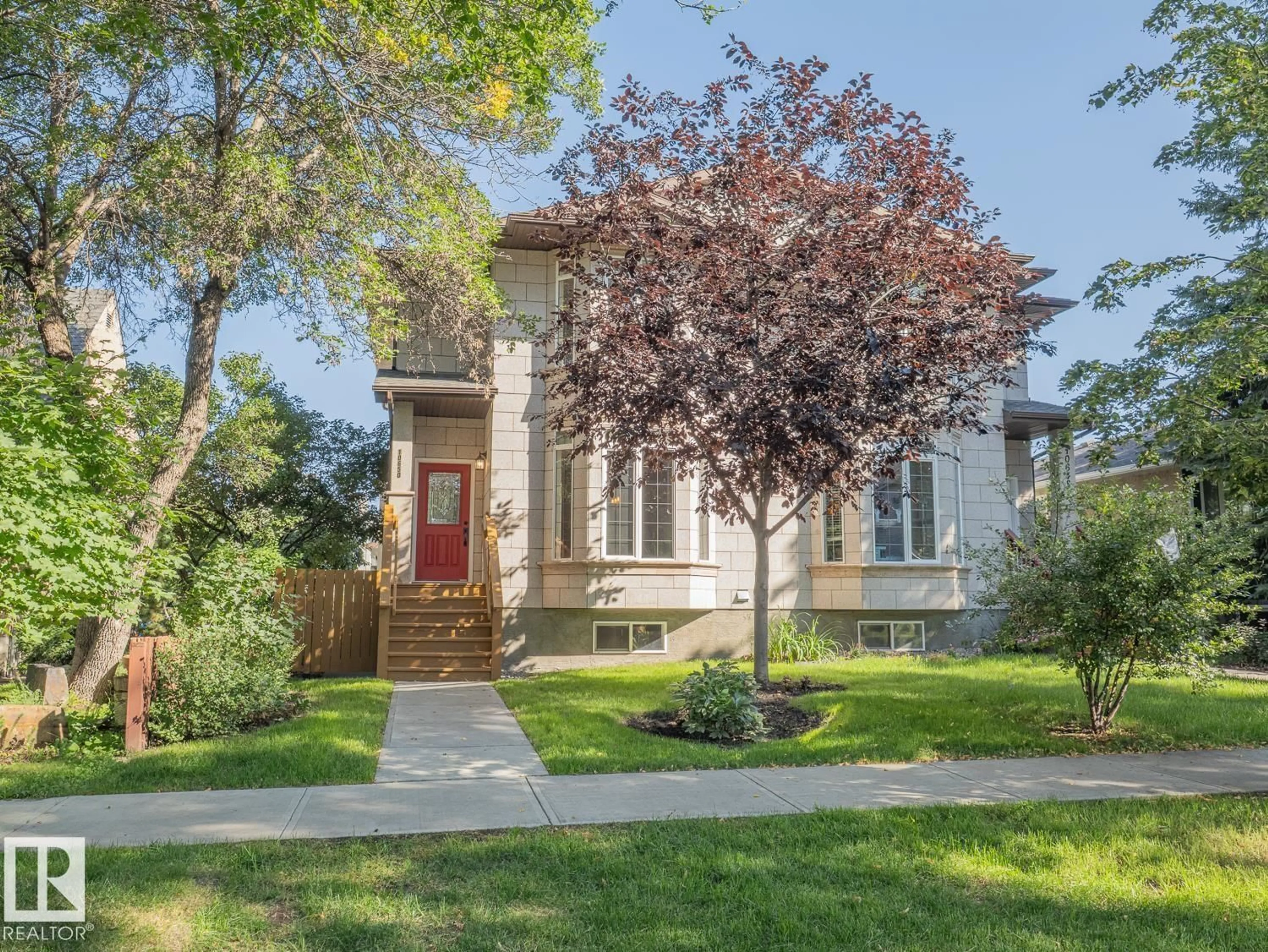 Home with brick exterior material, street for 10650 67 AV, Edmonton Alberta T6H1Z8