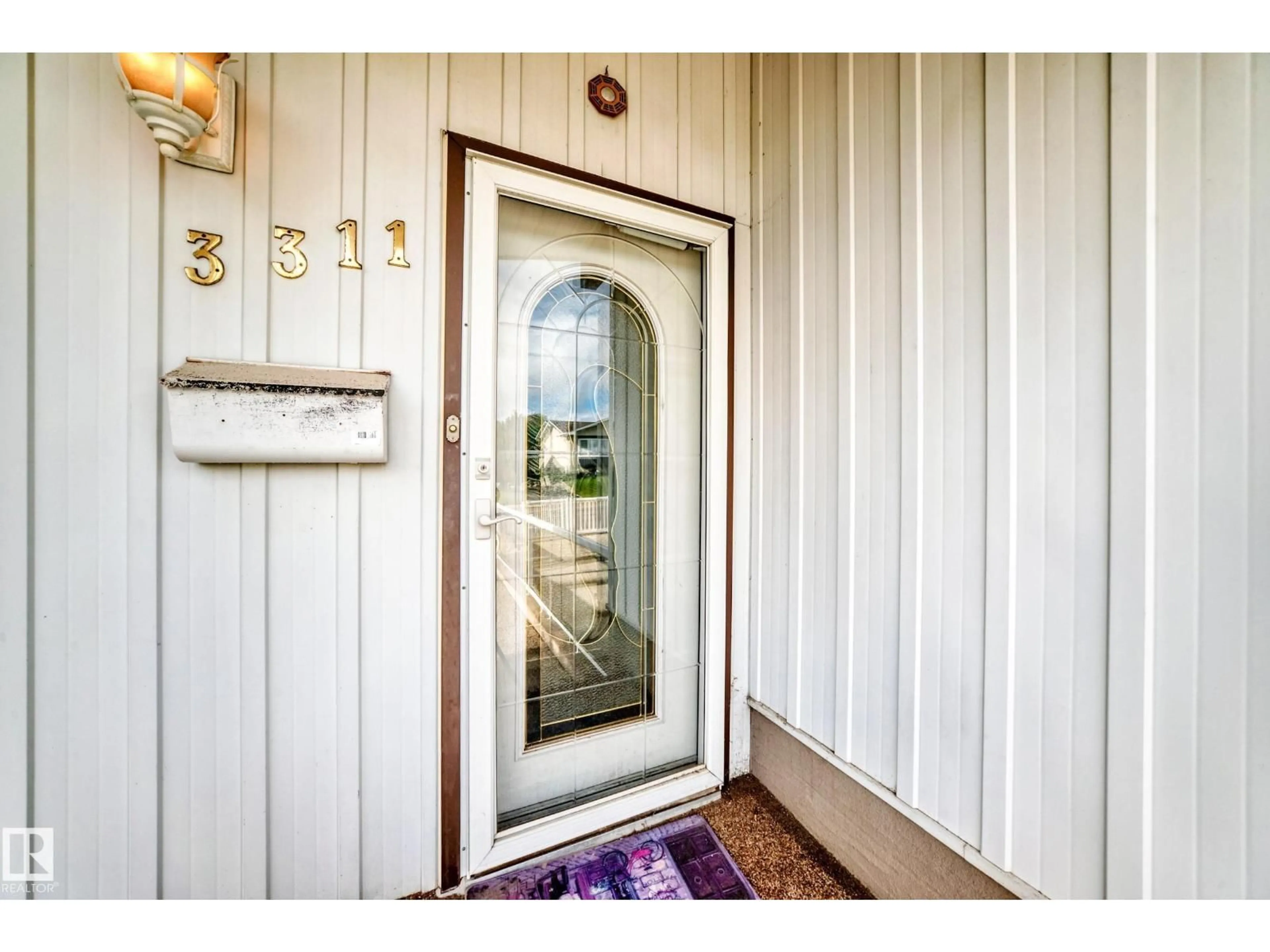 Indoor entryway for 3311 104 AV, Edmonton Alberta T5W0A8