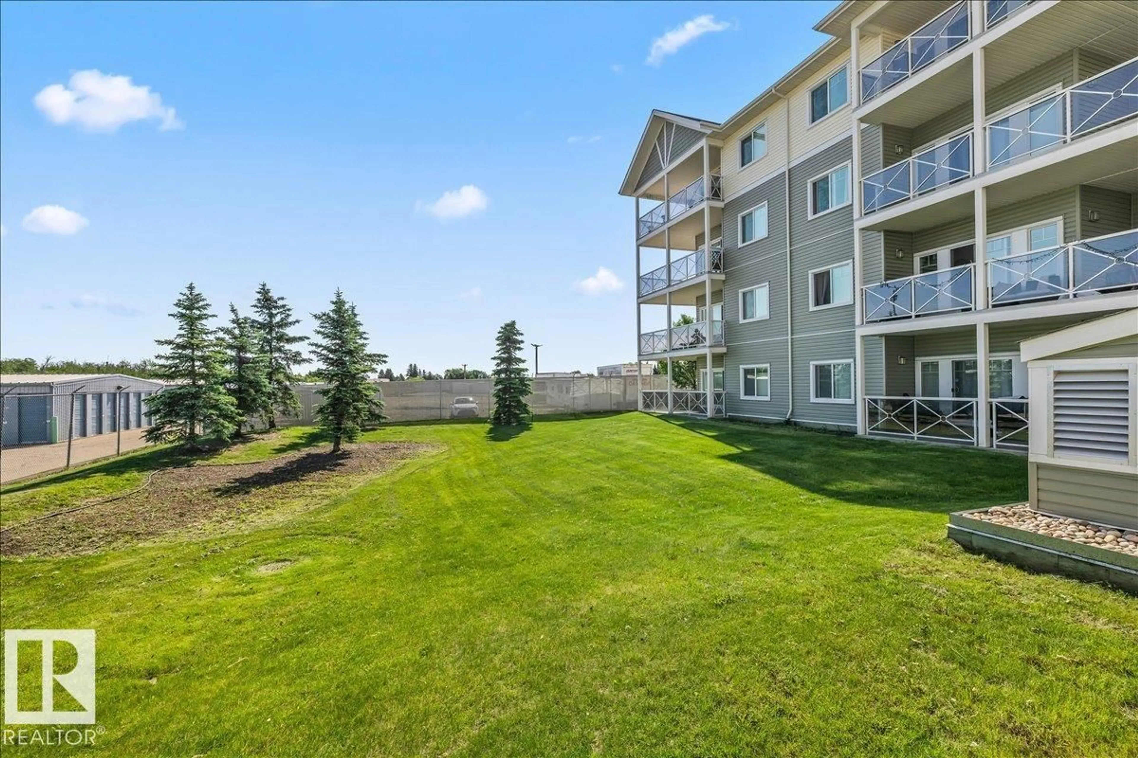 Patio, water/lake/river/ocean view for #114 - 12660 142 AV, Edmonton Alberta T5X0J5