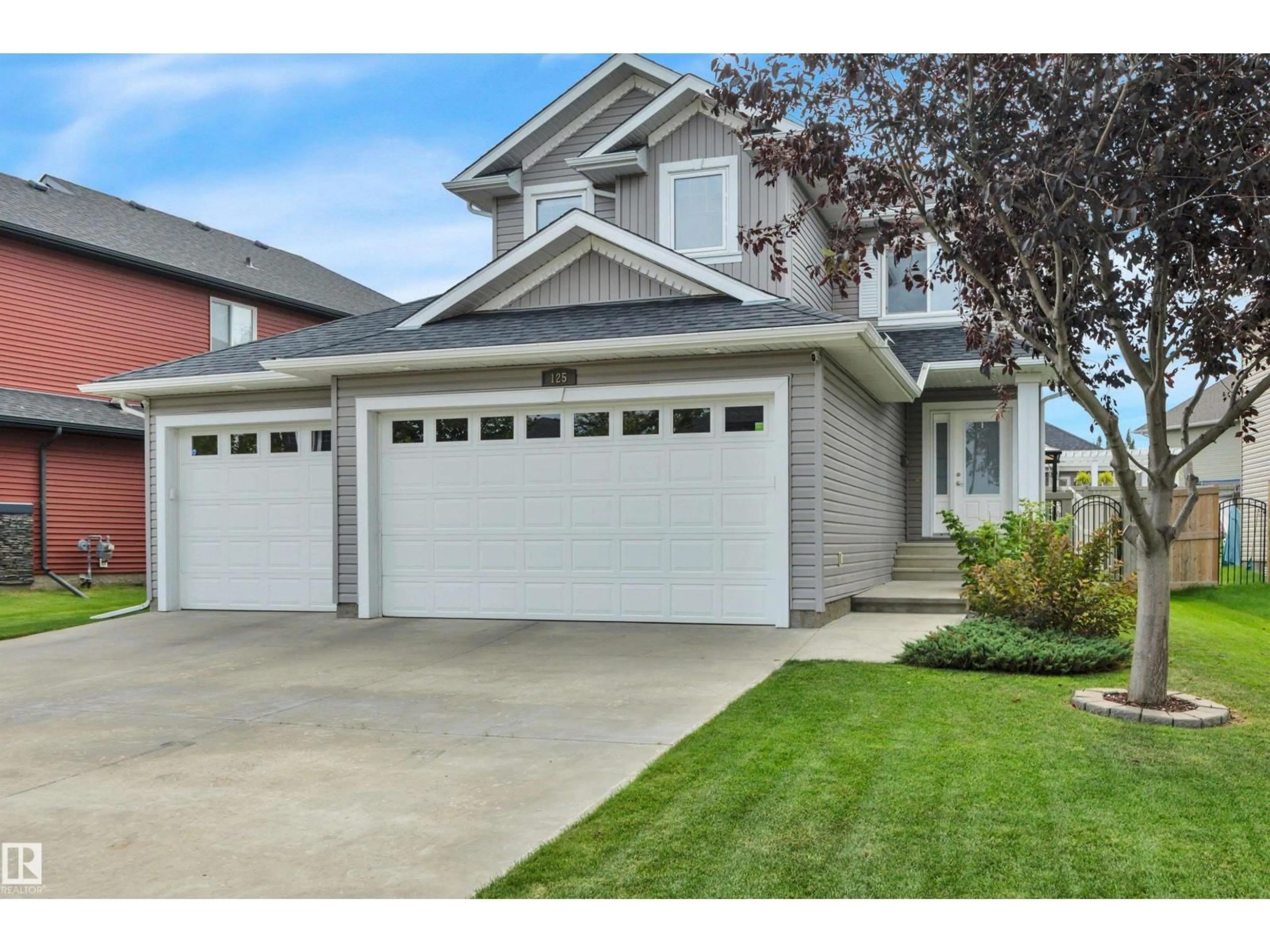 Home with vinyl exterior material, street for 125 RUE MONTALET, Beaumont Alberta T4X0W3