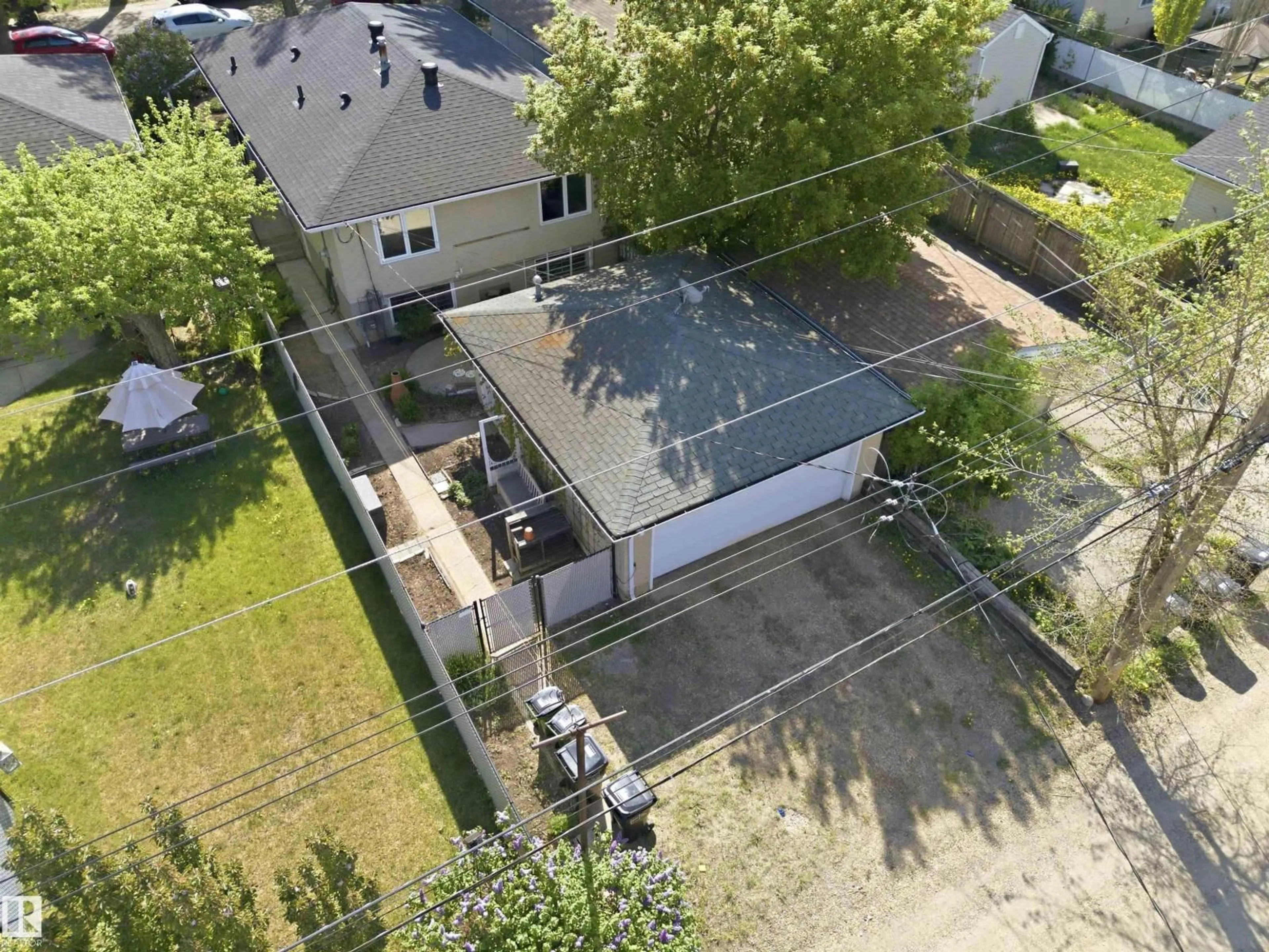 A pic from outside/outdoor area/front of a property/back of a property/a pic from drone, street for NW - 10138 74 ST, Edmonton Alberta T6H2X9